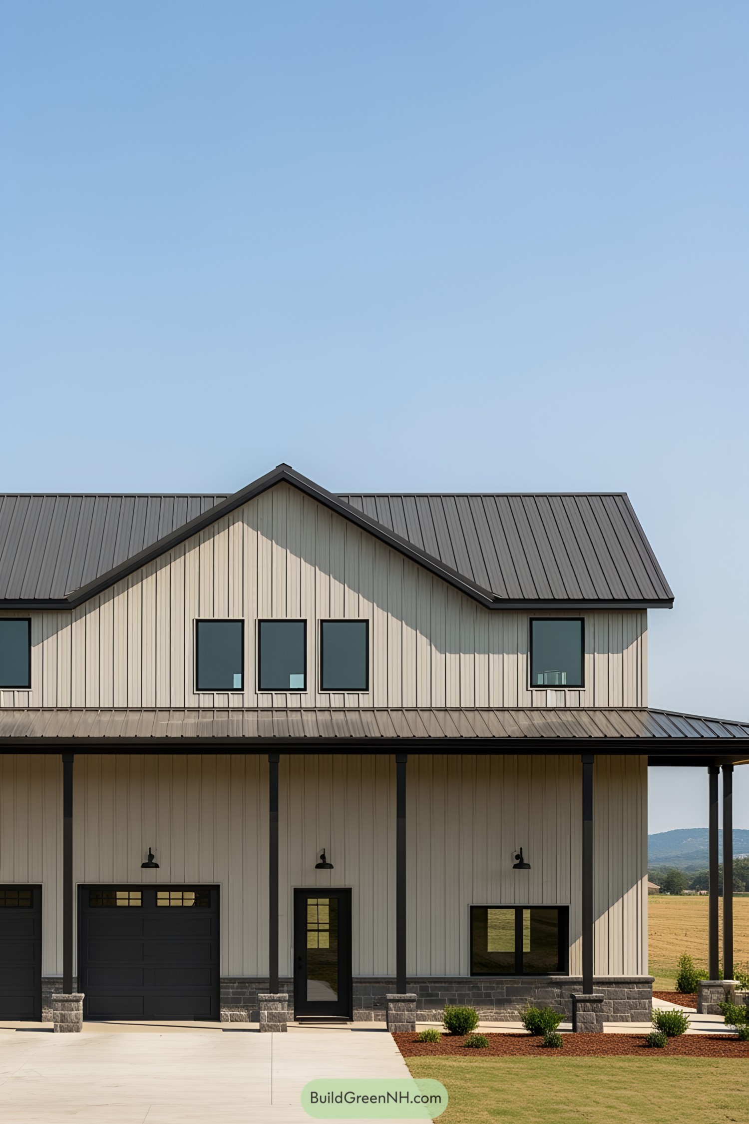 Barndominium with a garage and large windows