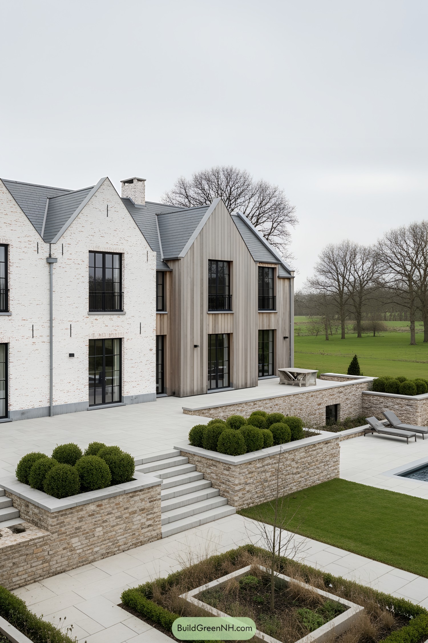 Modern Belgian farmhouse with brick and wood facade, surrounded by manicured greenery