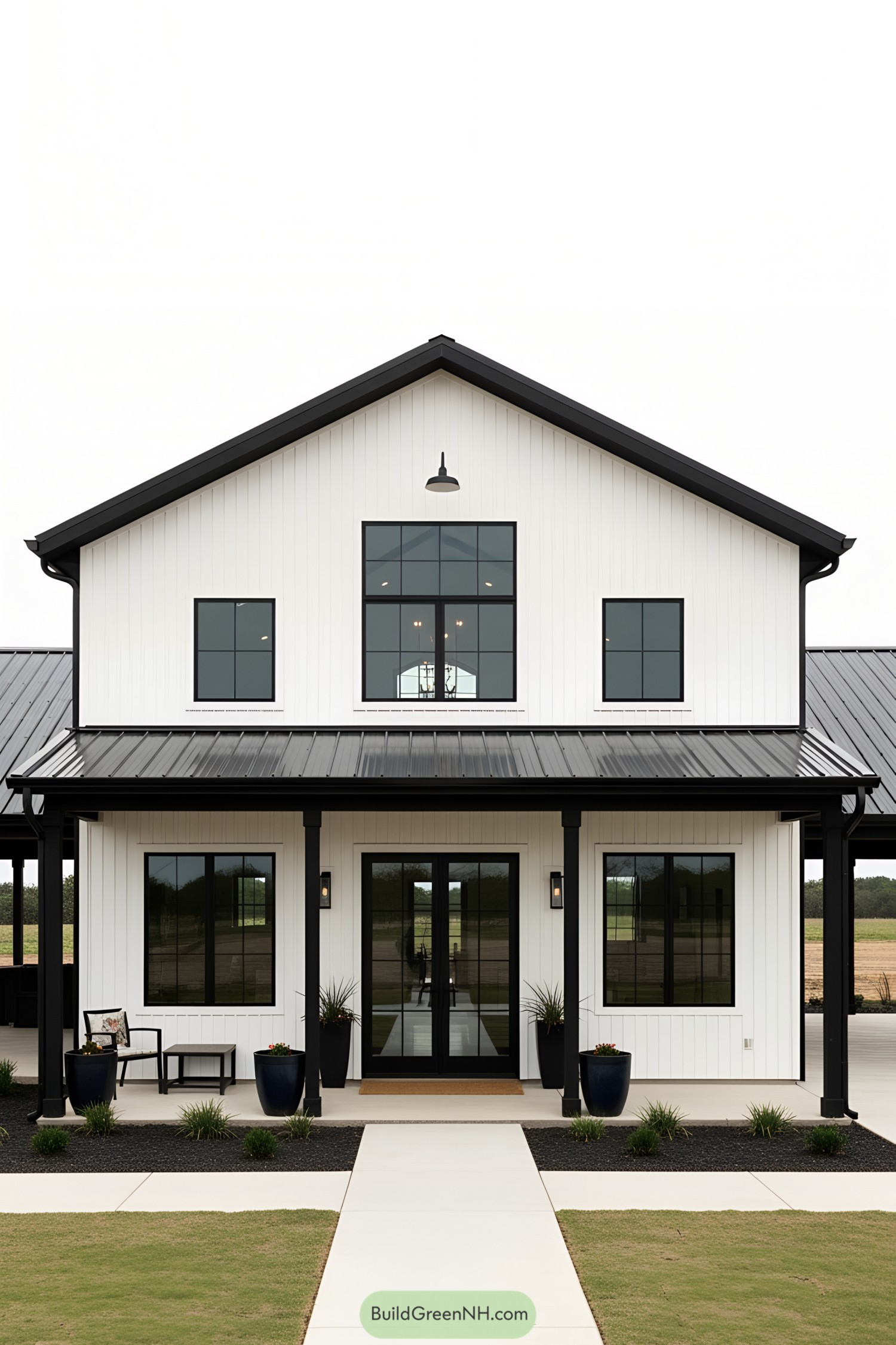 Stylish black and white barndominium with a modern twist