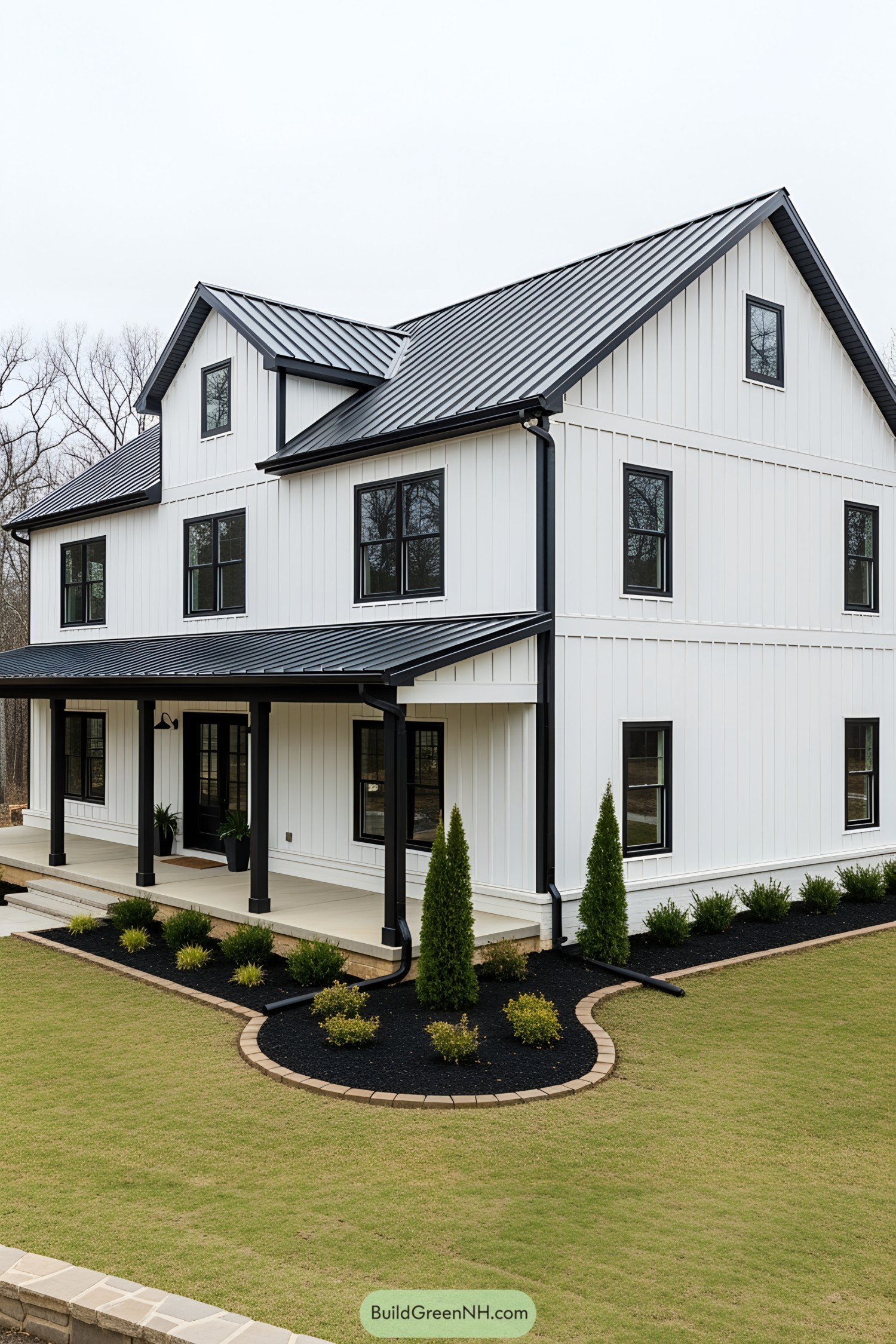 Sleek barndominium with a black and white exterior