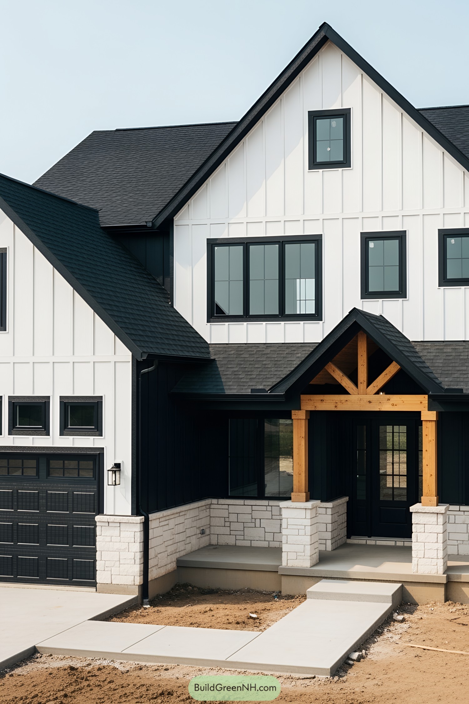 Modern black and white farmhouse with rustic wood accents