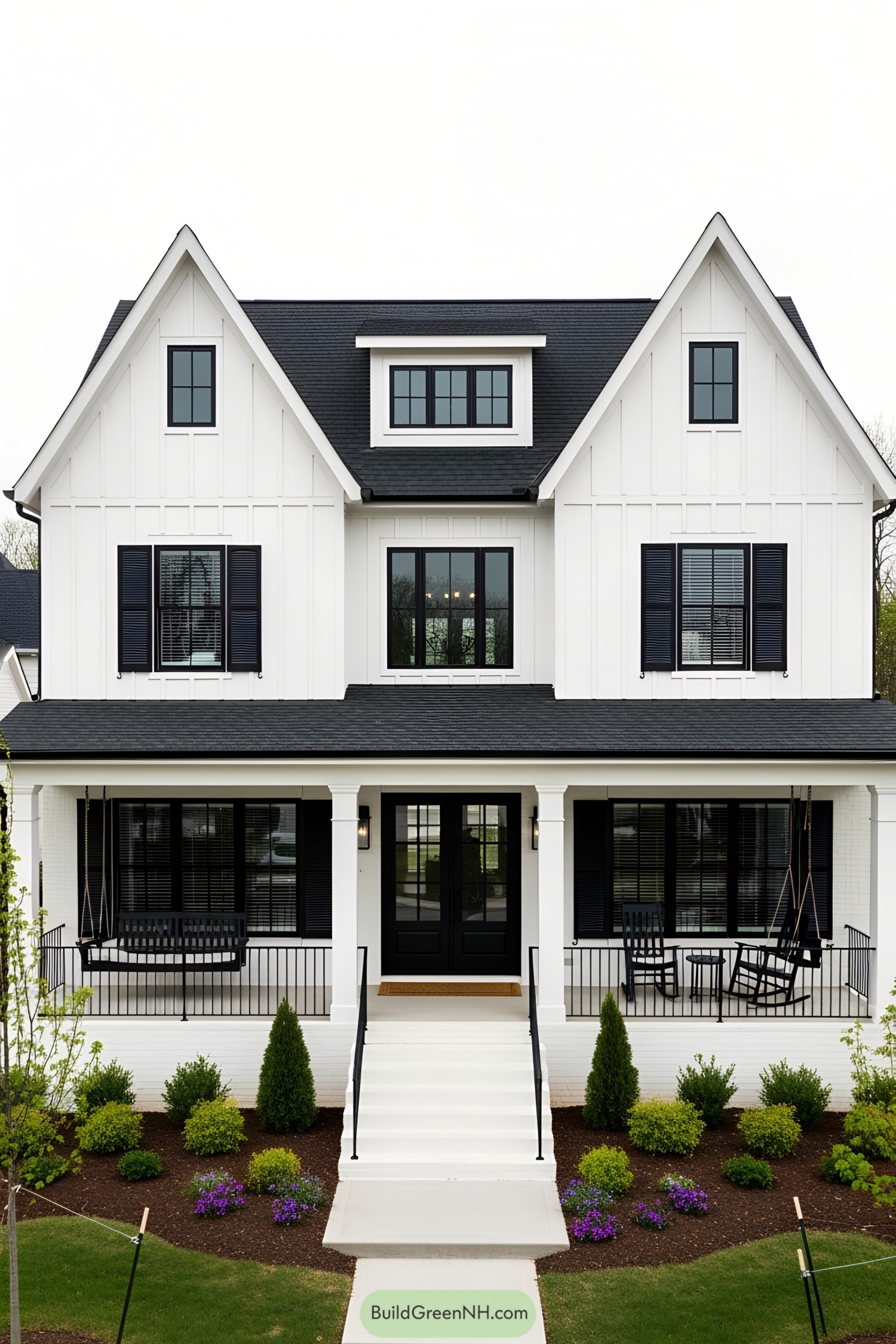Black and white modern farmhouse with porch swing