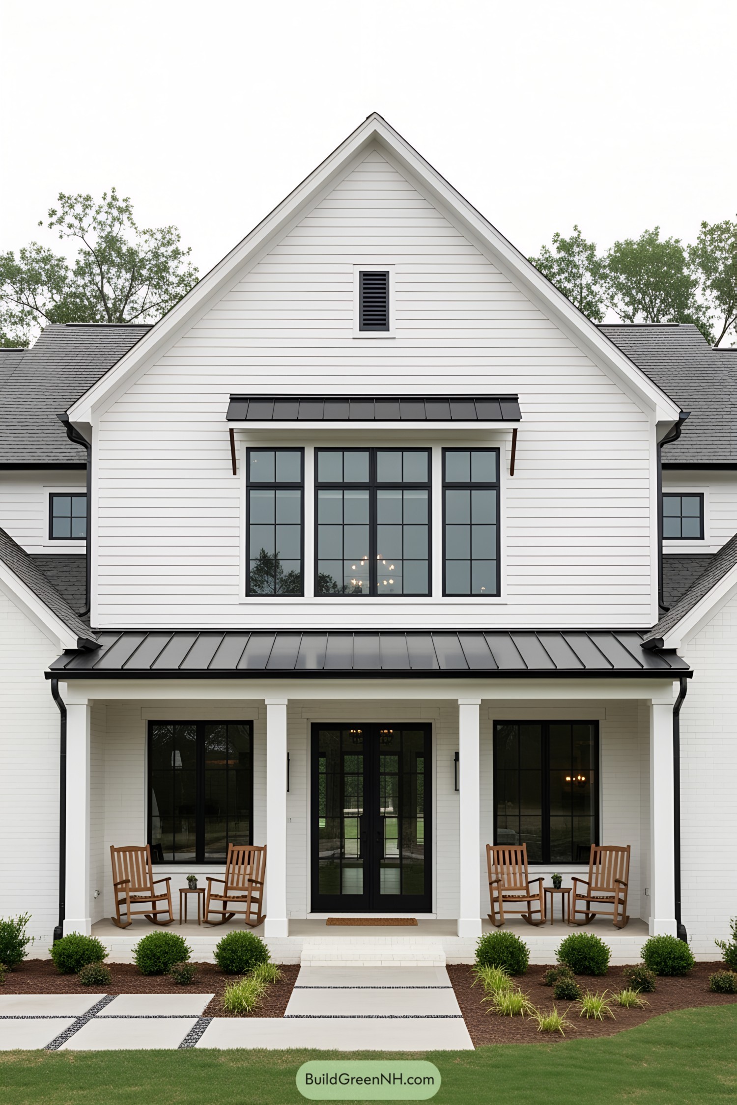 Modern black and white farmhouse with front porch