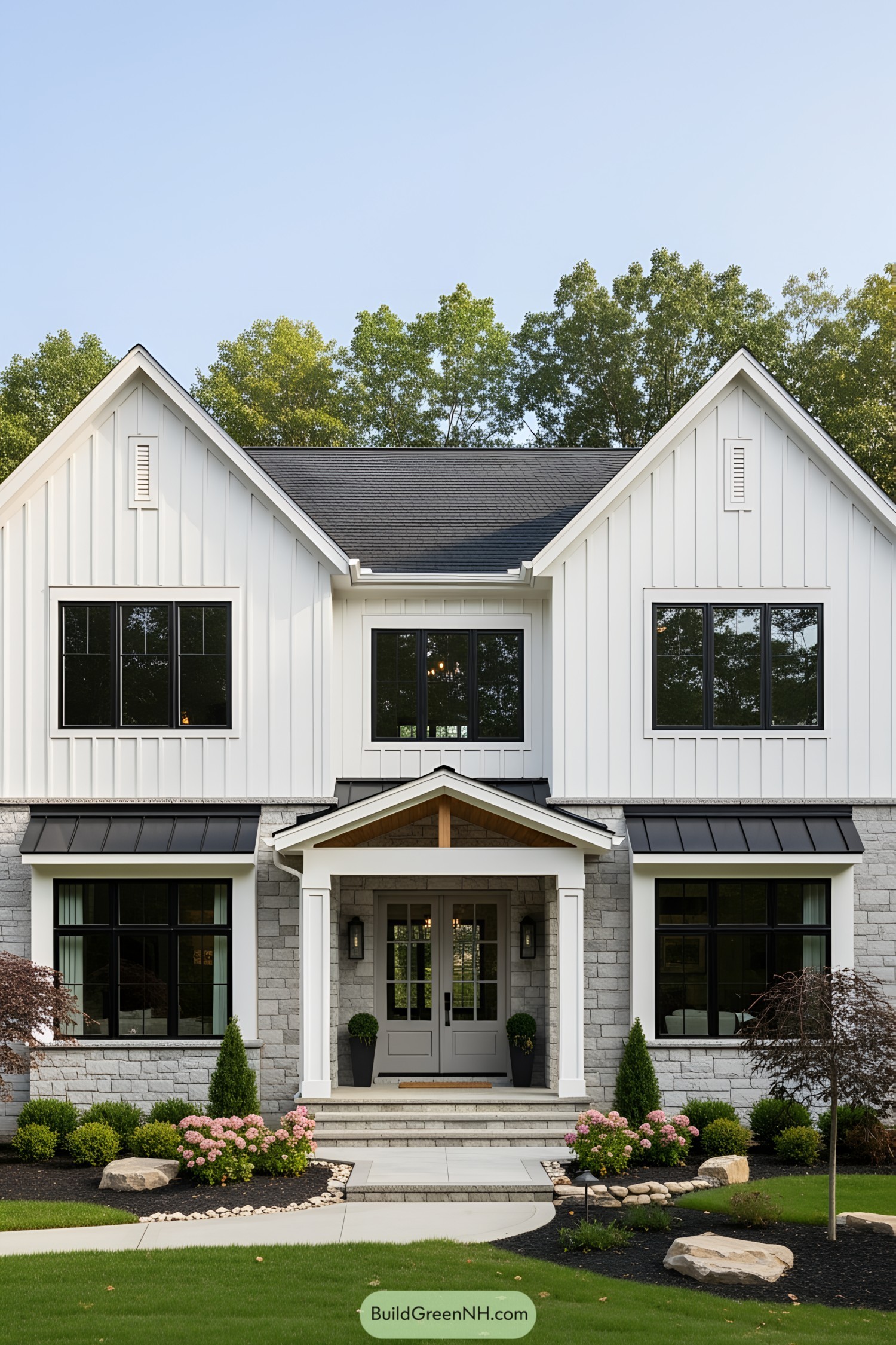 Modern farmhouse with black windows and white siding