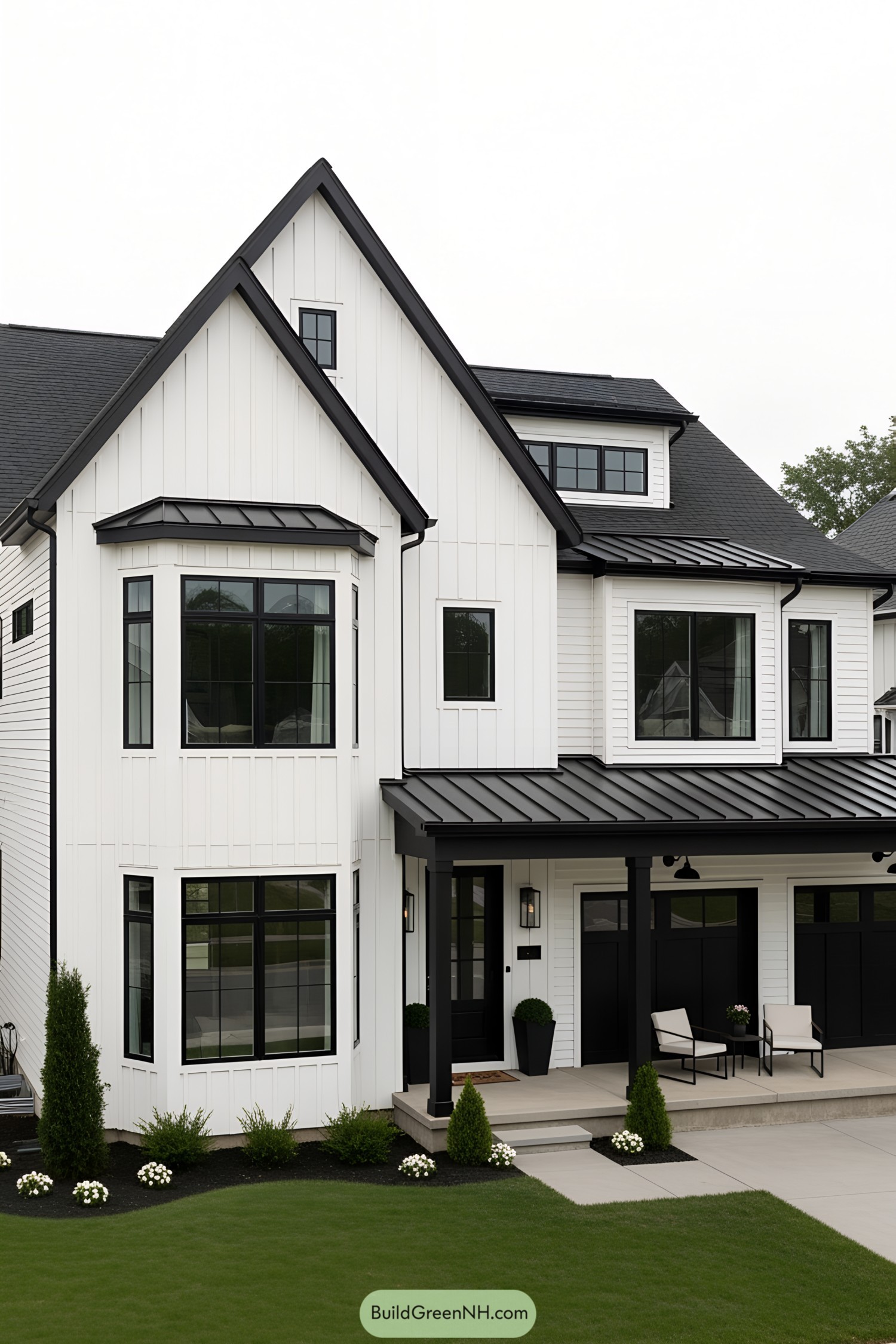 Modern black and white farmhouse with sharp angles and sleek lines