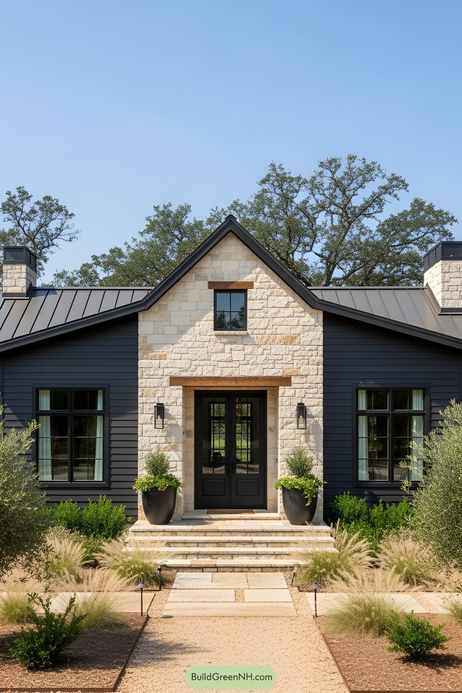 Black ranch house with stone accents and lush surroundings