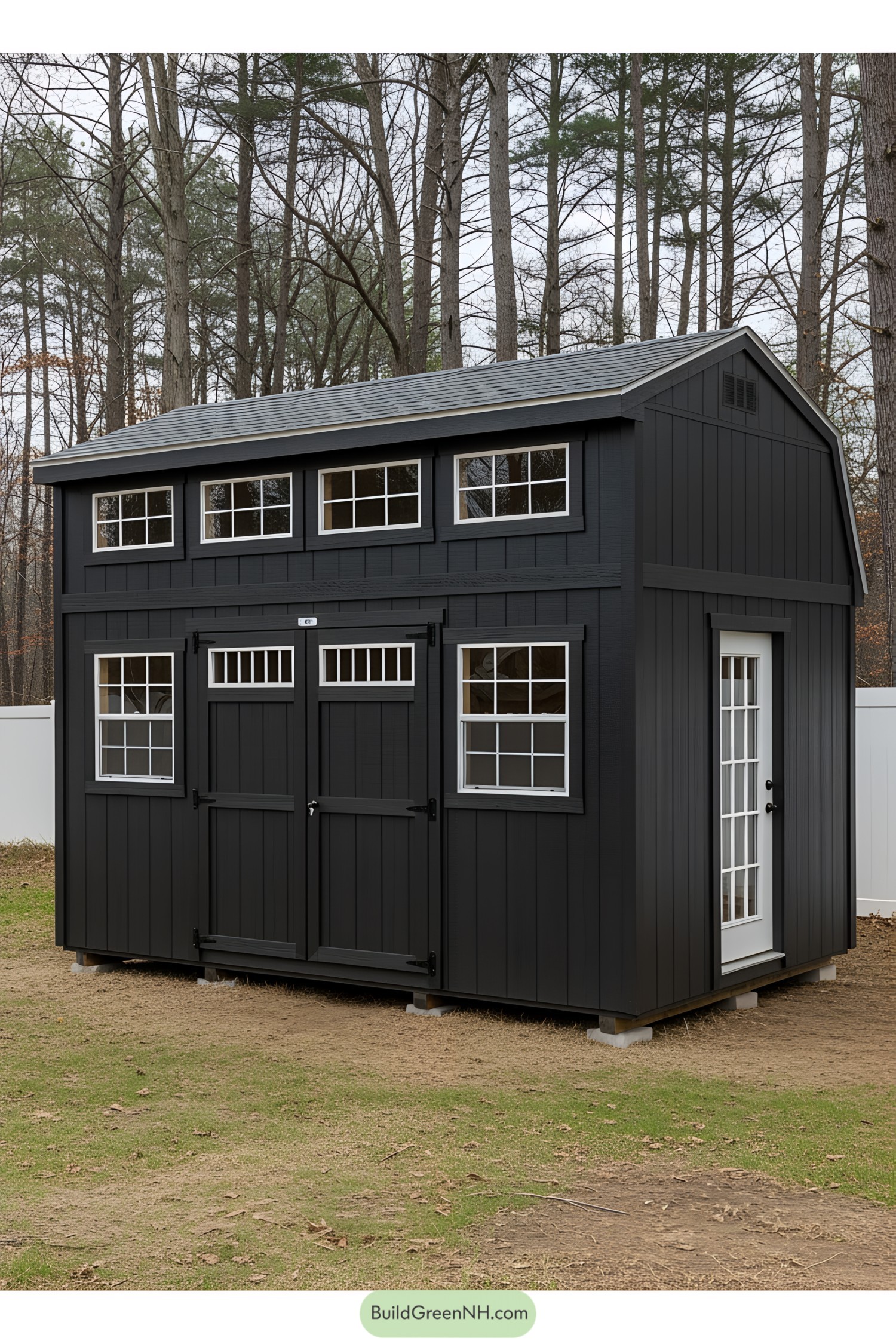 Compact black shed with multiple windows and a slanted roof
