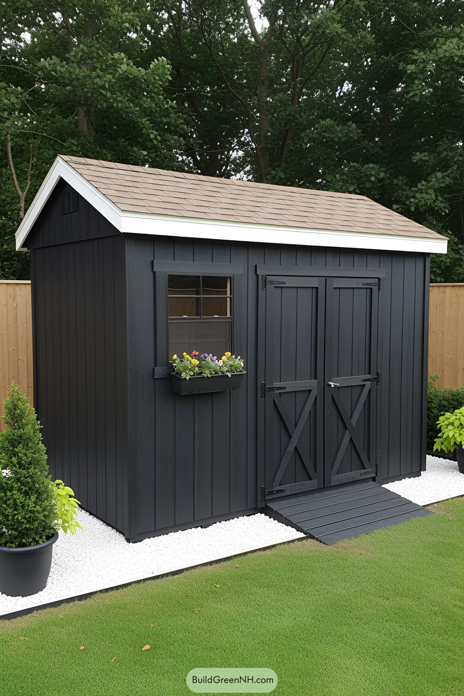 Black shed with double doors and flower box