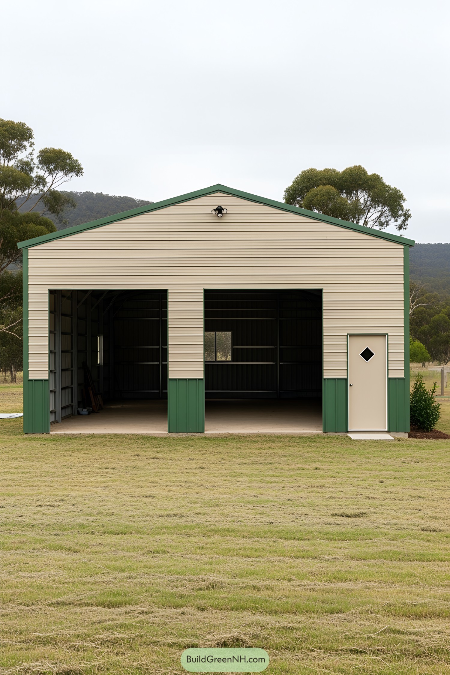 Green and beige metal car shed with open doors
