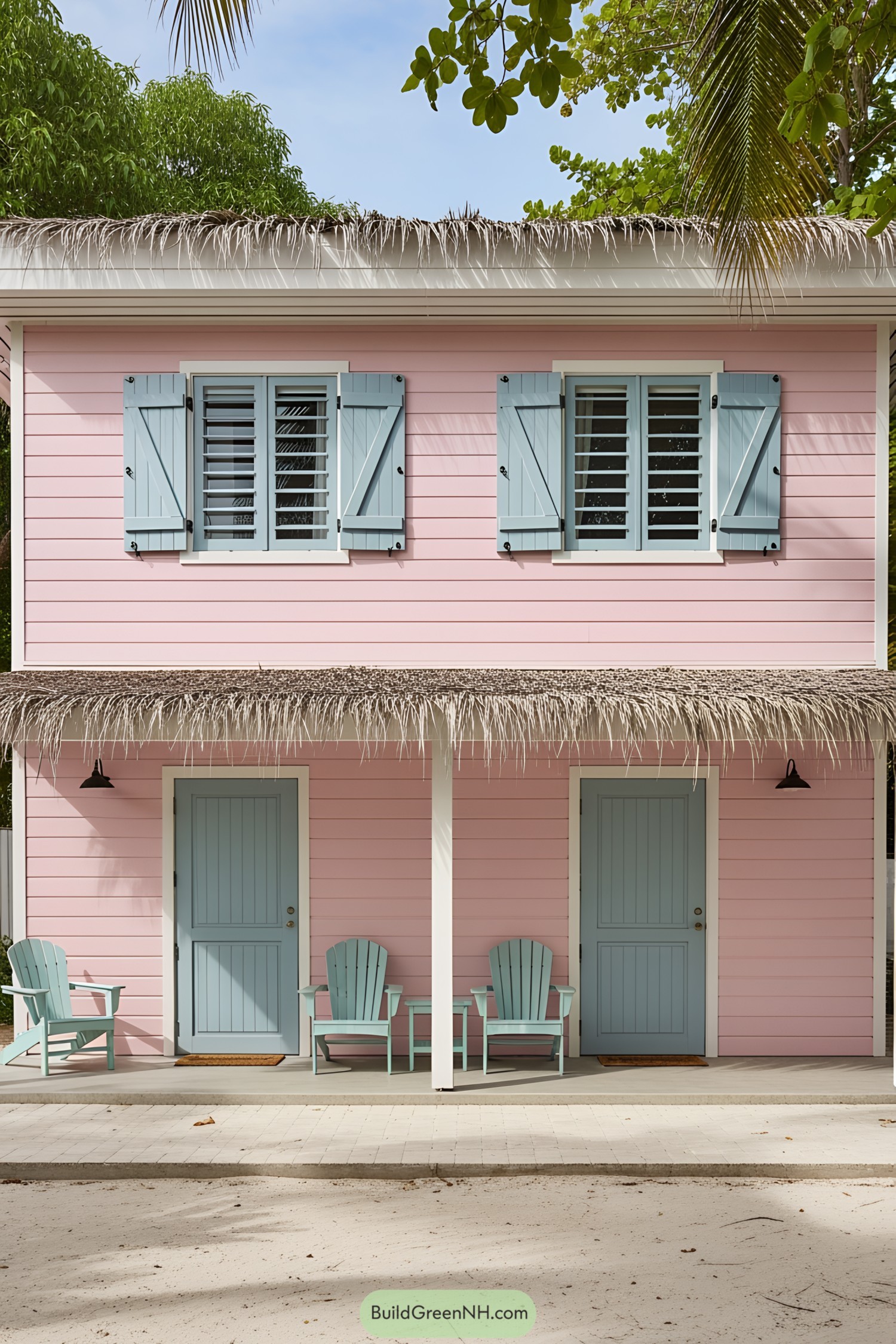 Pink house with blue shutters and thatched roof