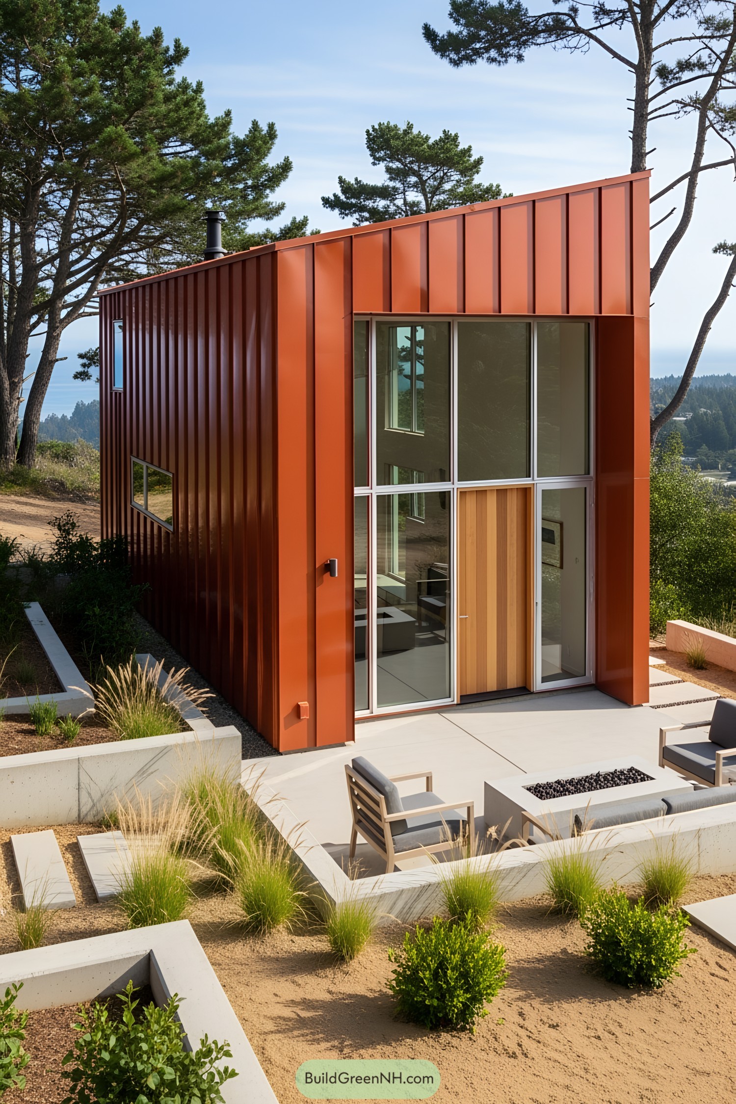 A modern tiny home with a bold red exterior surrounded by greenery