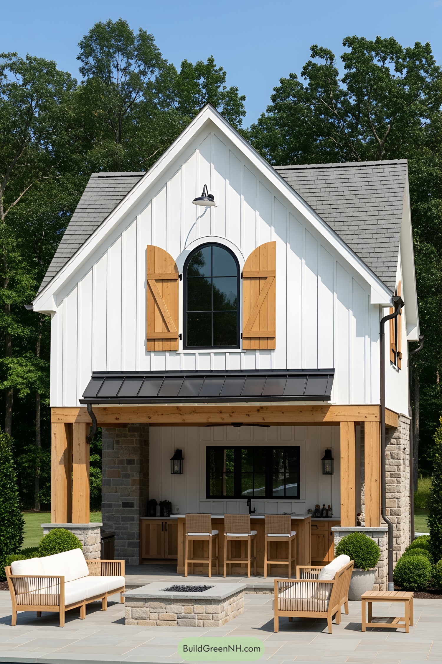 Charming farmhouse pool house with outdoor seating and wooden accents