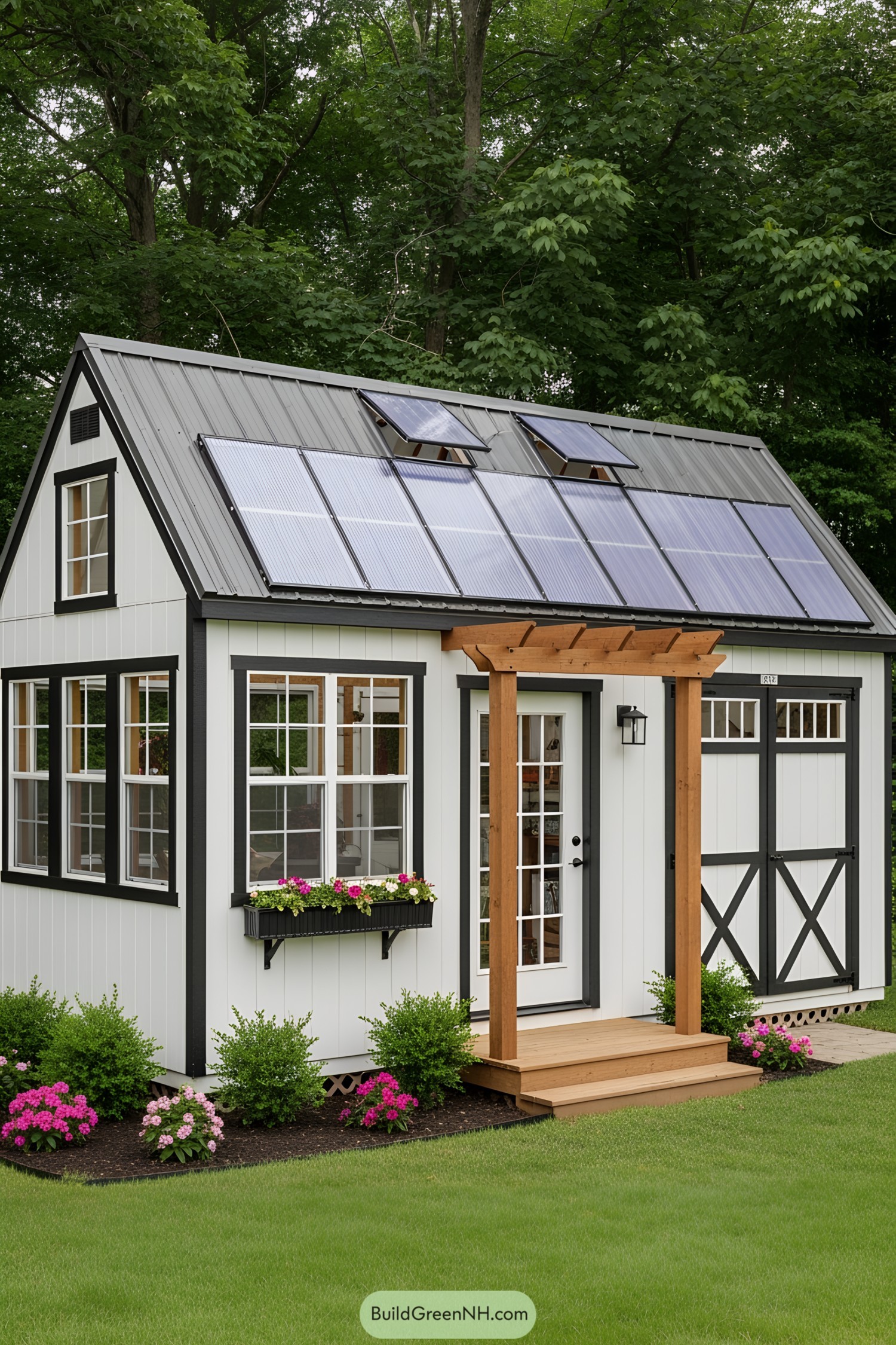 Wooden shed with solar panels and garden in front