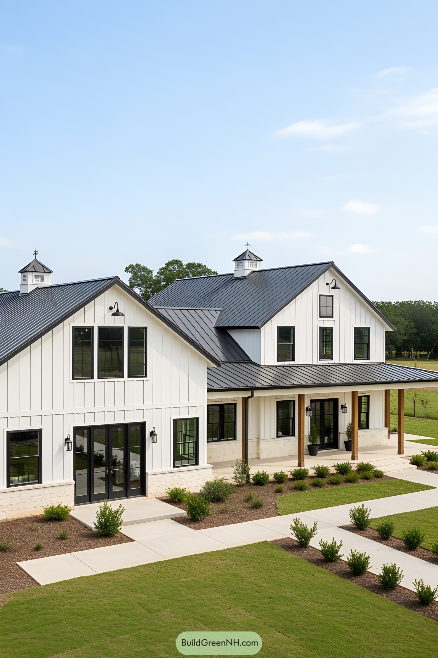 Chic L-shaped building with black roof and white walls