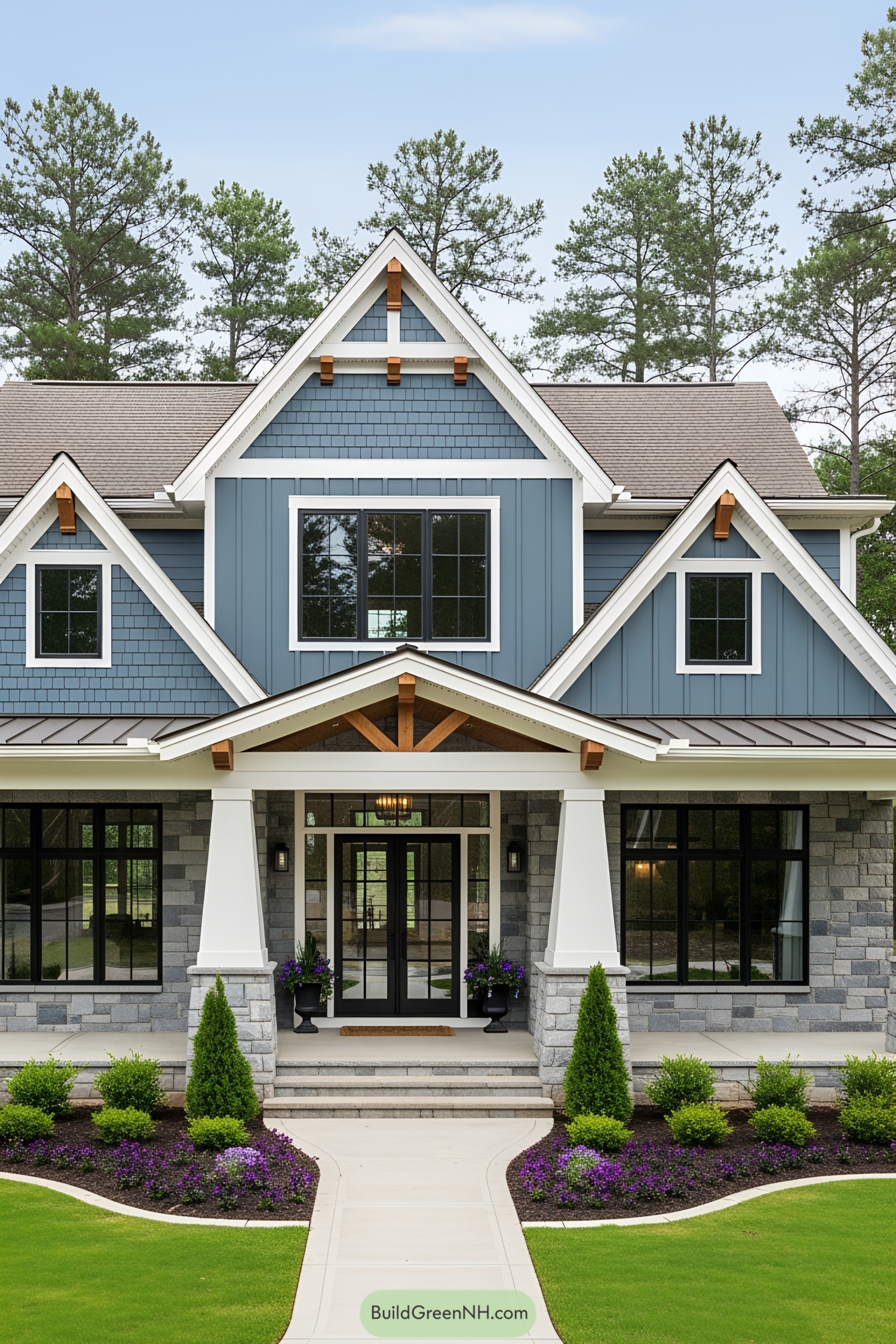 Stylish home with blue siding and stone accents
