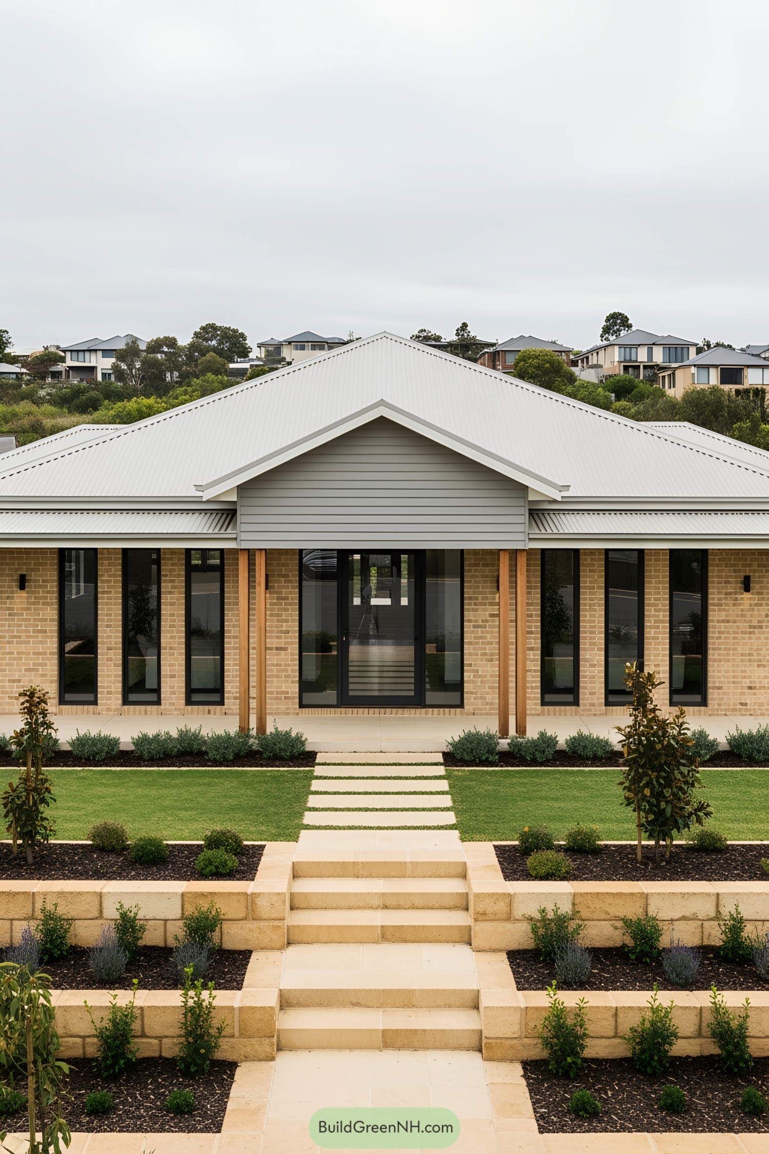 Modern Australian farmhouse with a gabled roof and landscaped yard