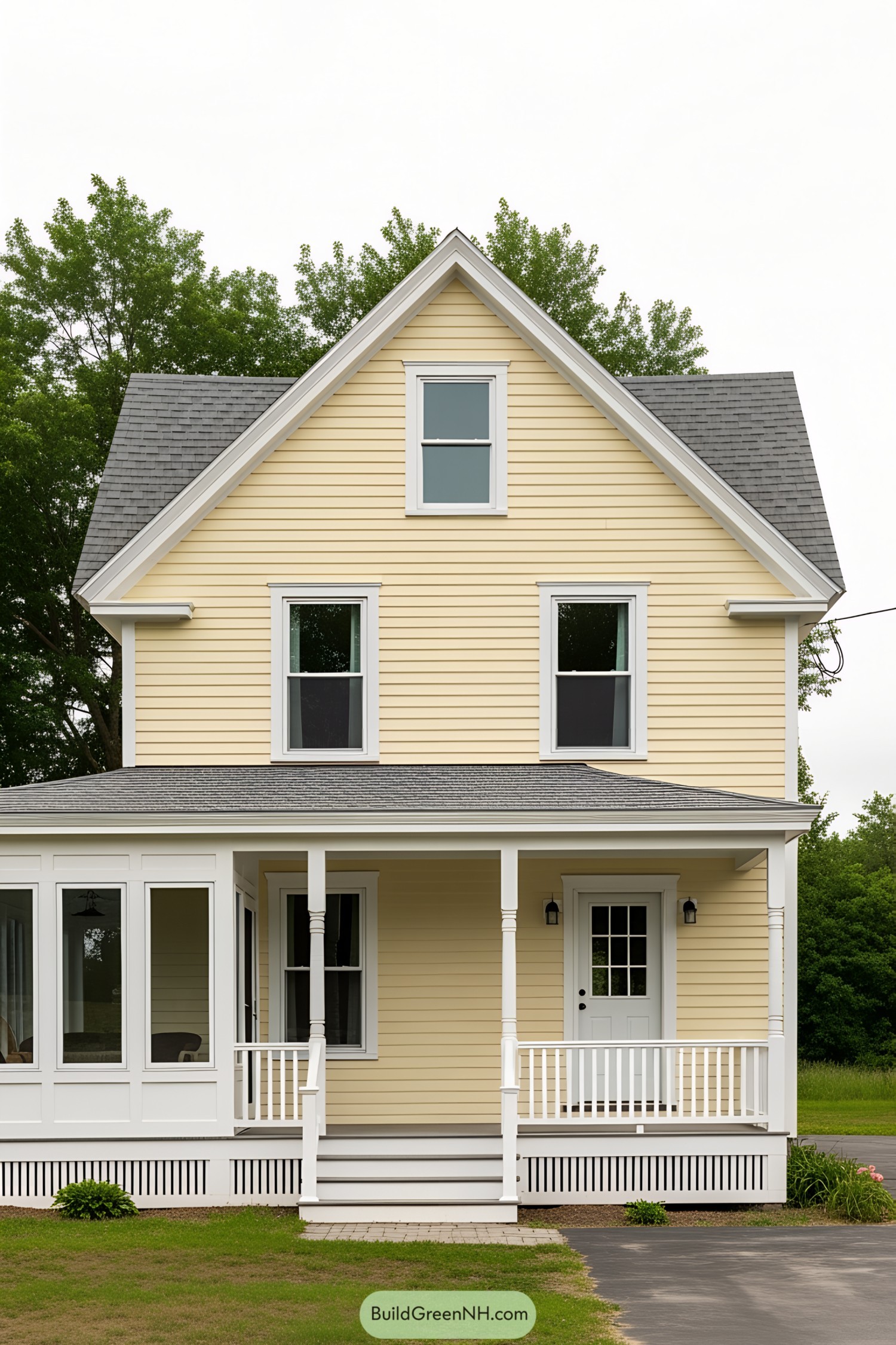 Charming yellow farmhouse with classic gable roof