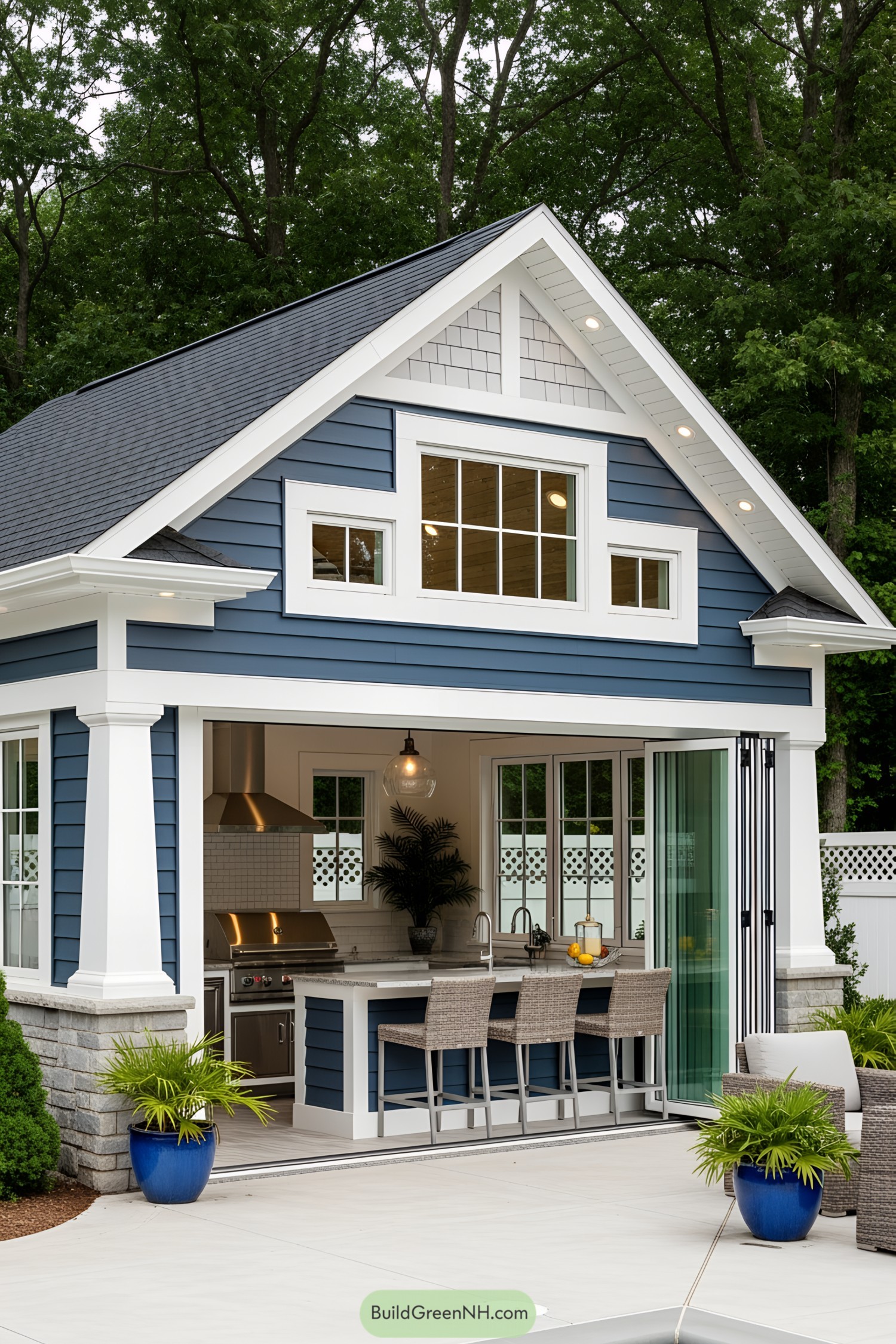 Blue and white cabana with open kitchen near pool