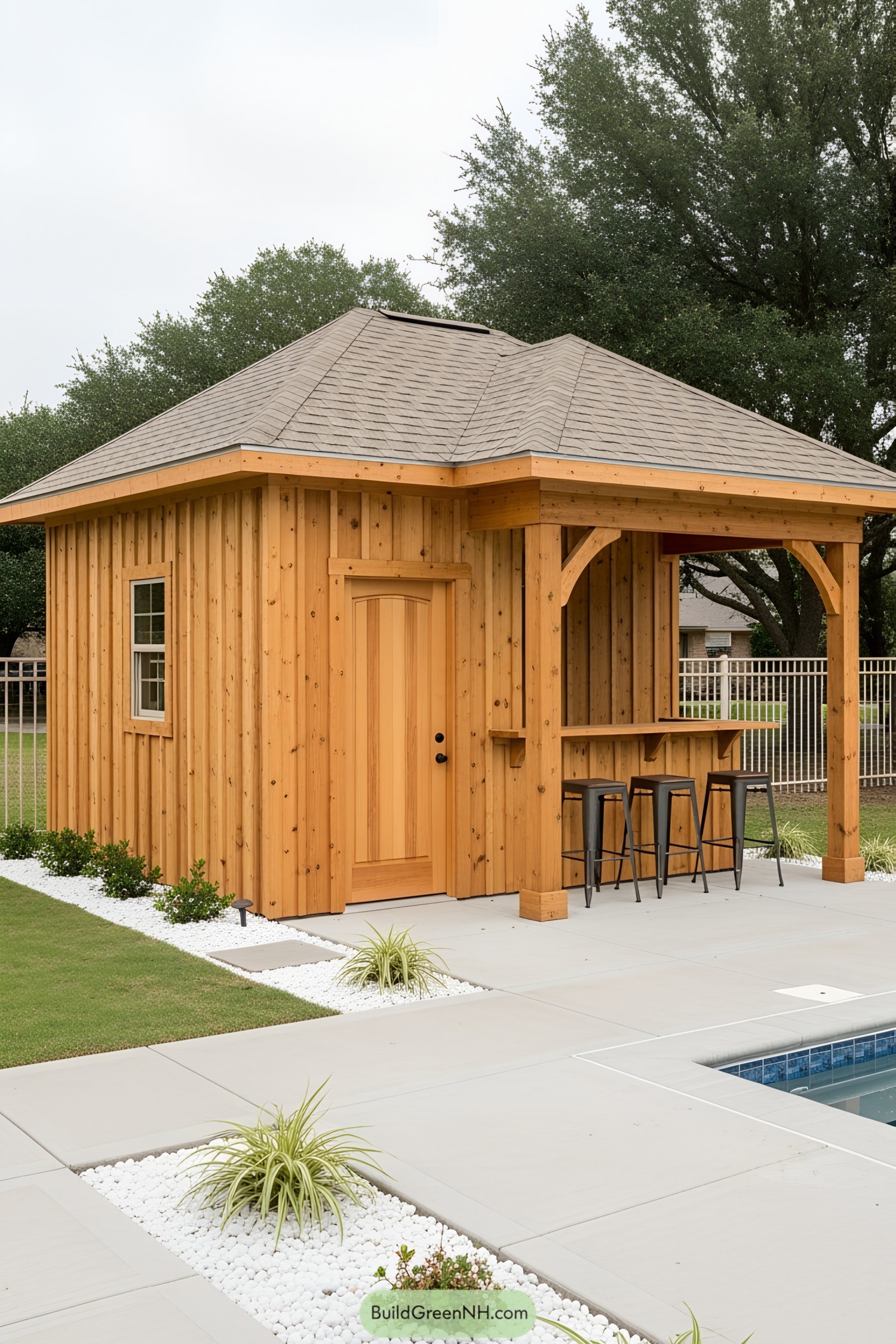 Wooden poolside cabana with bar stools
