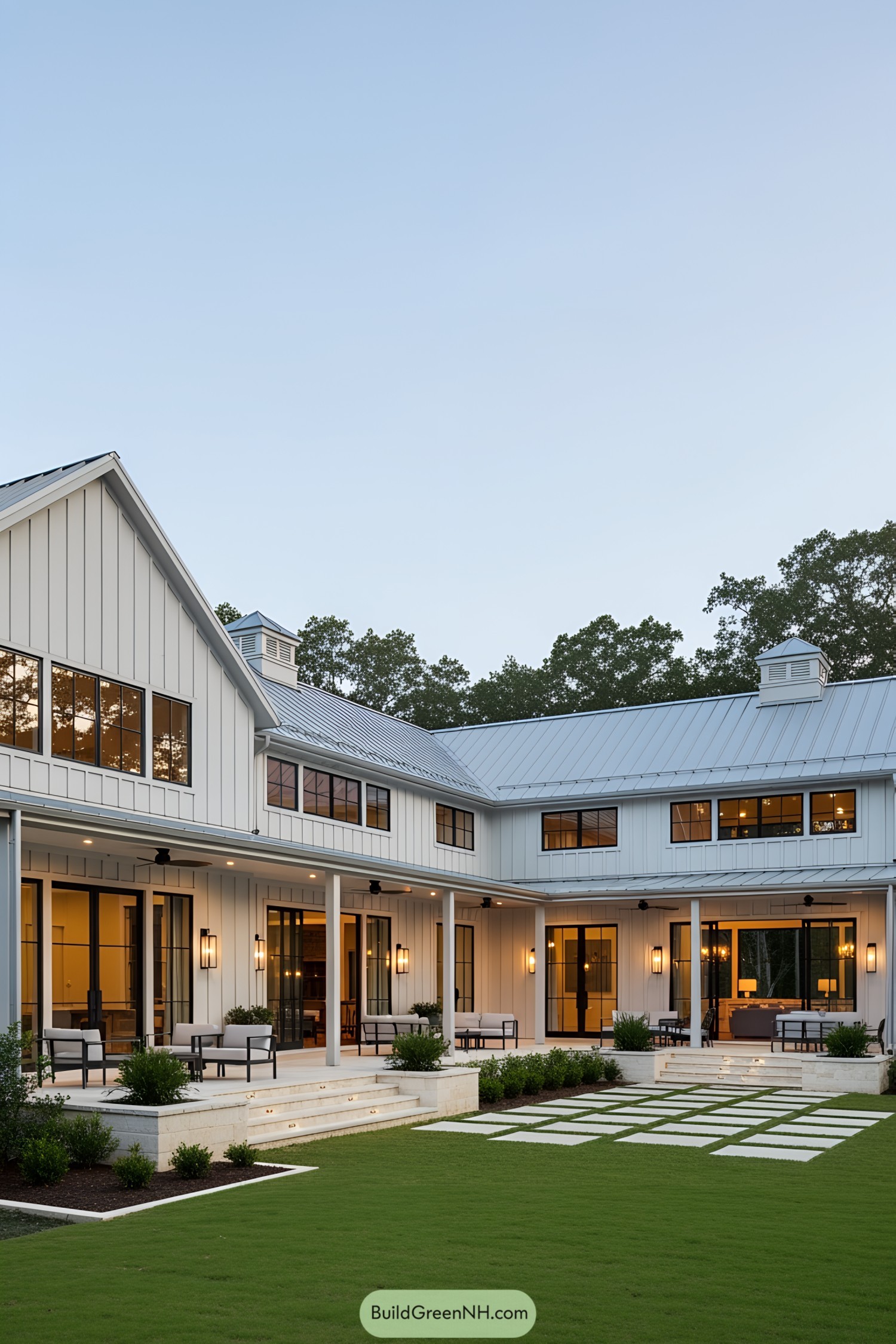 Luxurious barndominium exterior with spacious porch