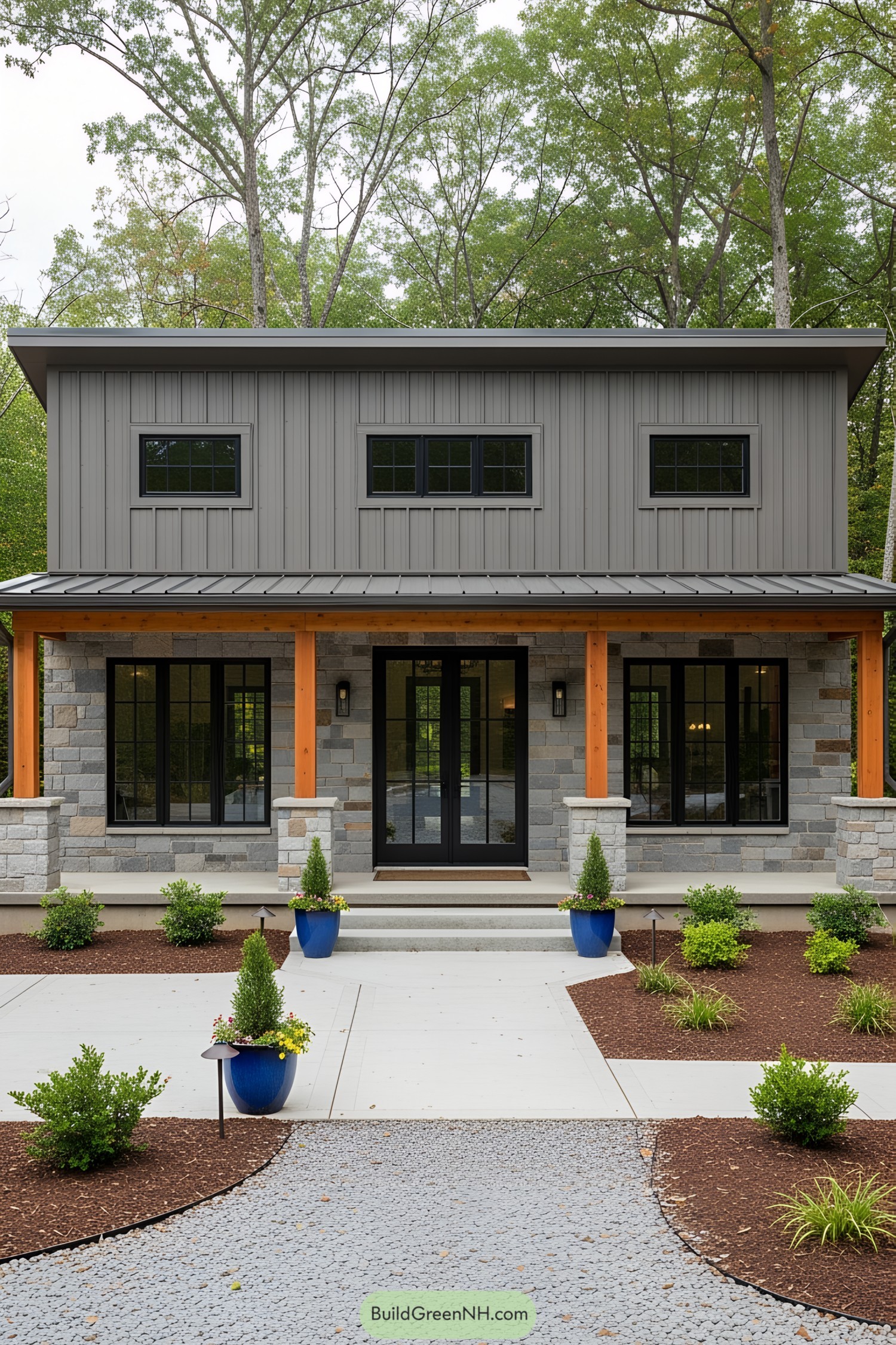Single-level home with a stone facade and vibrant blue planters