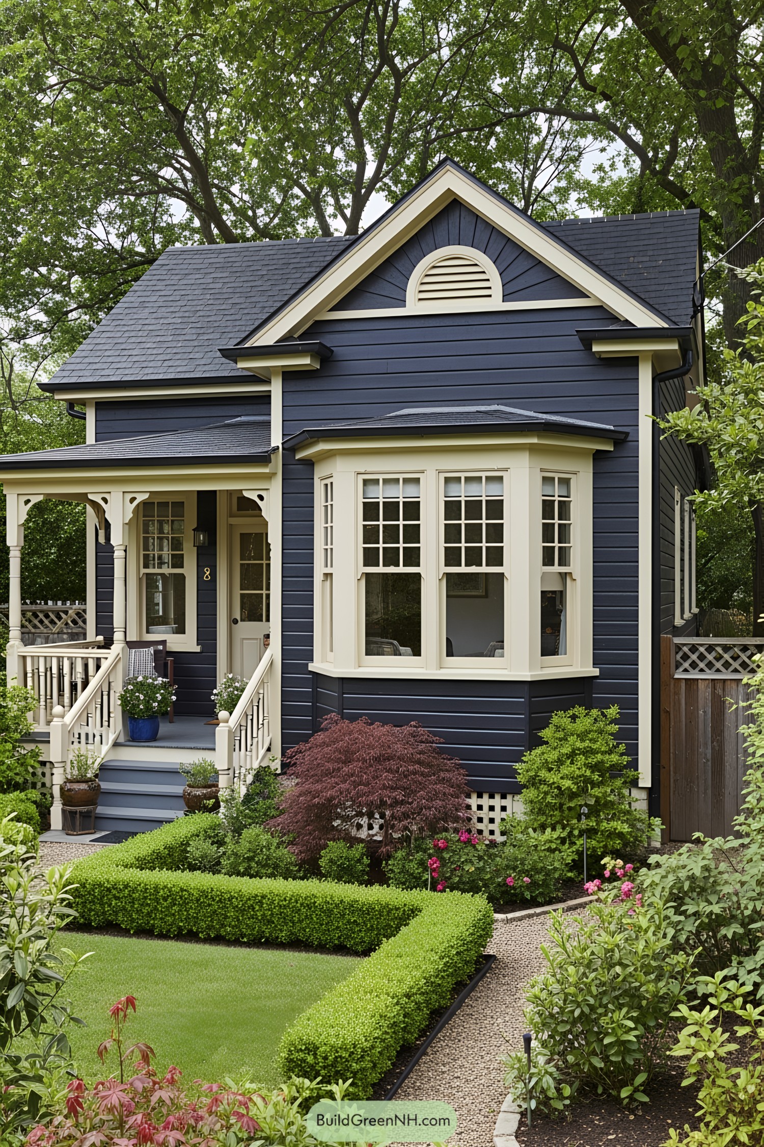 Navy cottage with creamy accents and lush garden