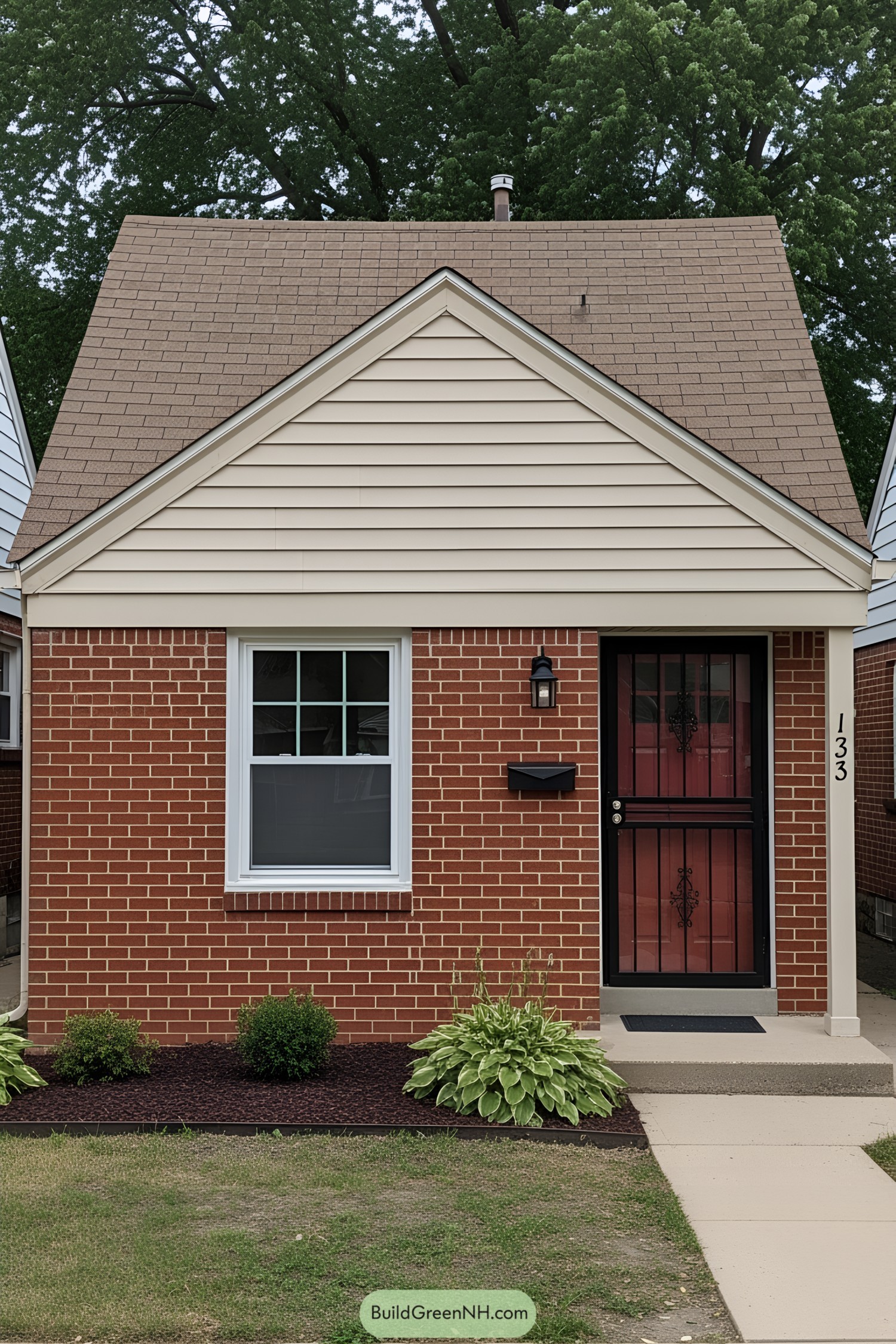 Quaint small cottage with brick and wood sidings