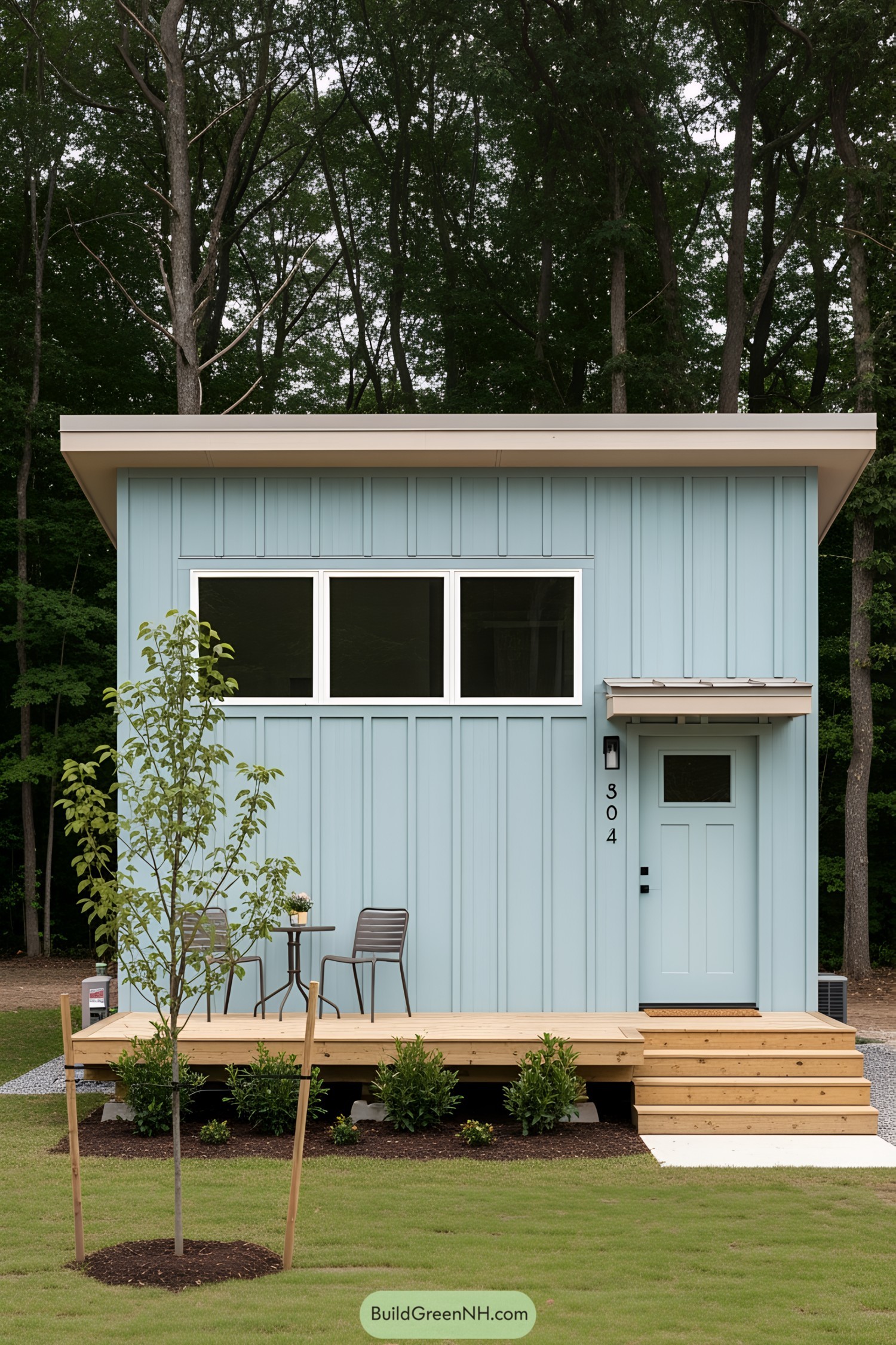 Minimalist light blue tiny house with modern design