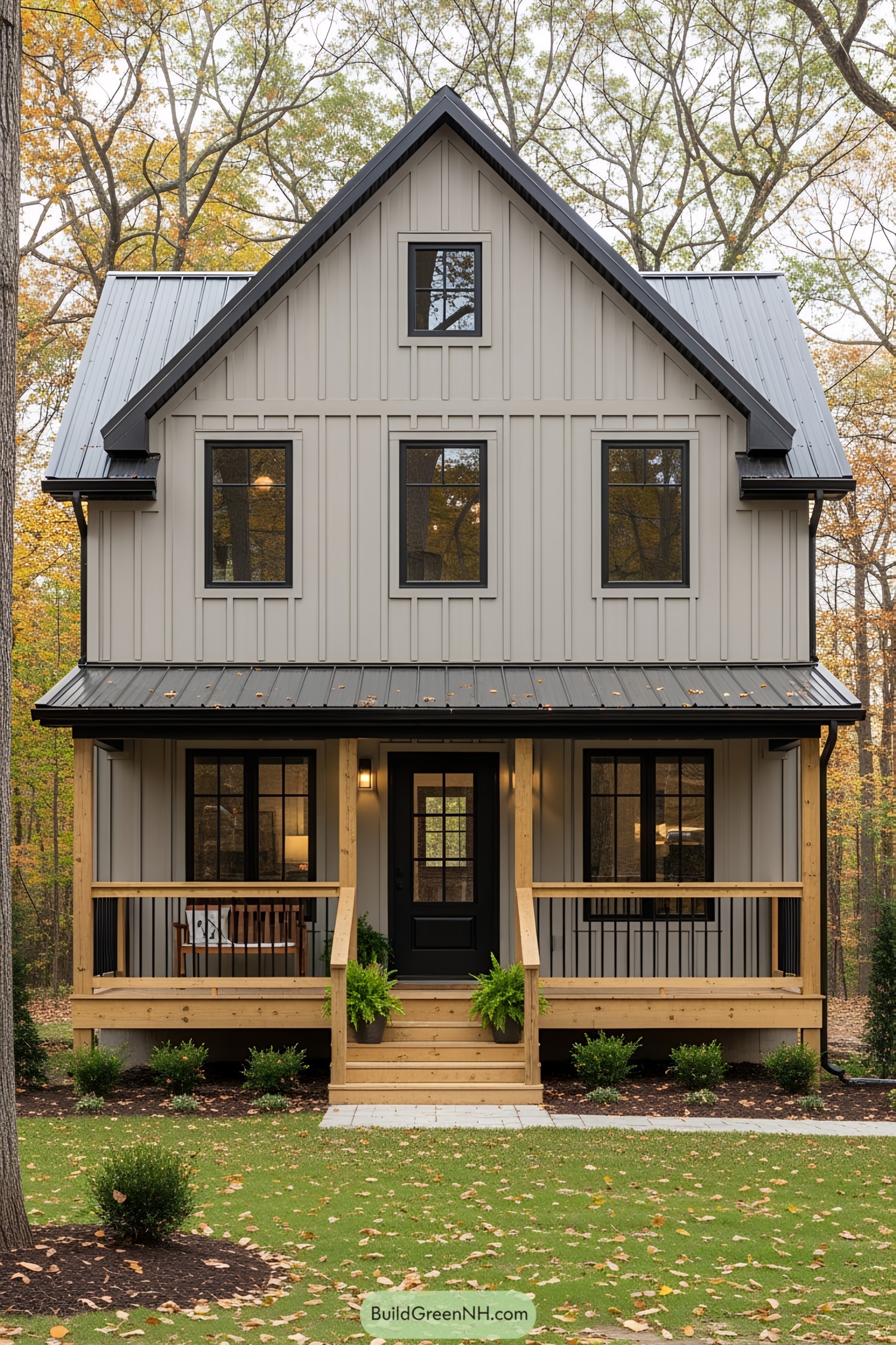 Small beige house with black roof