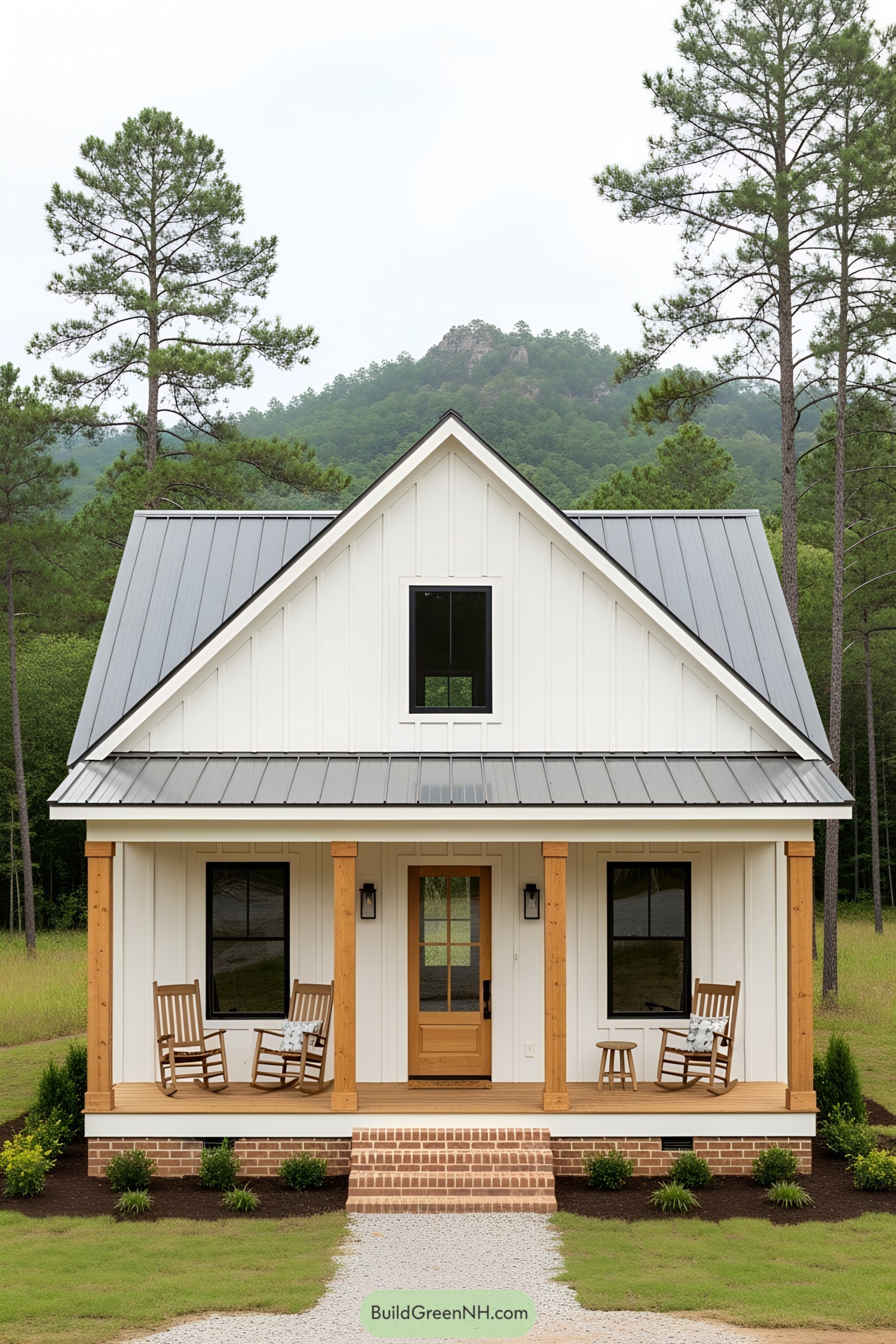 A small white farmhouse with a gable roof
