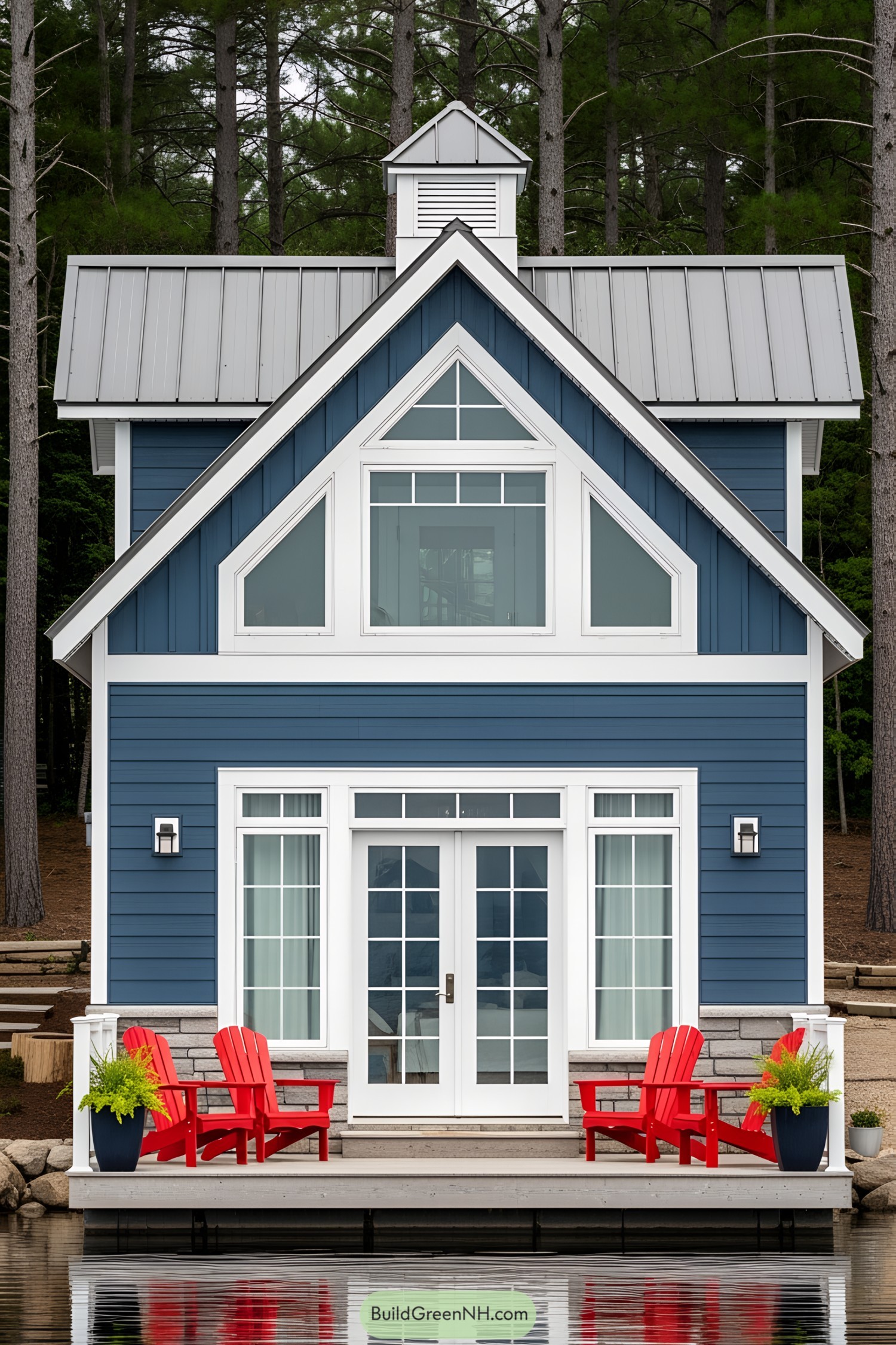 Charming blue lake house with red chairs
