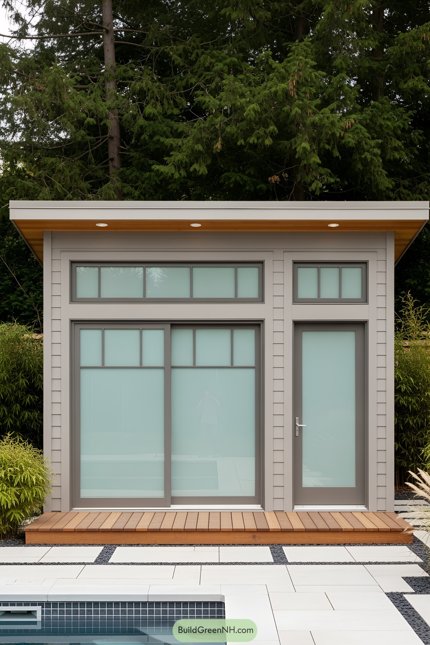 Small modern pool house with frosted glass and wooden accents