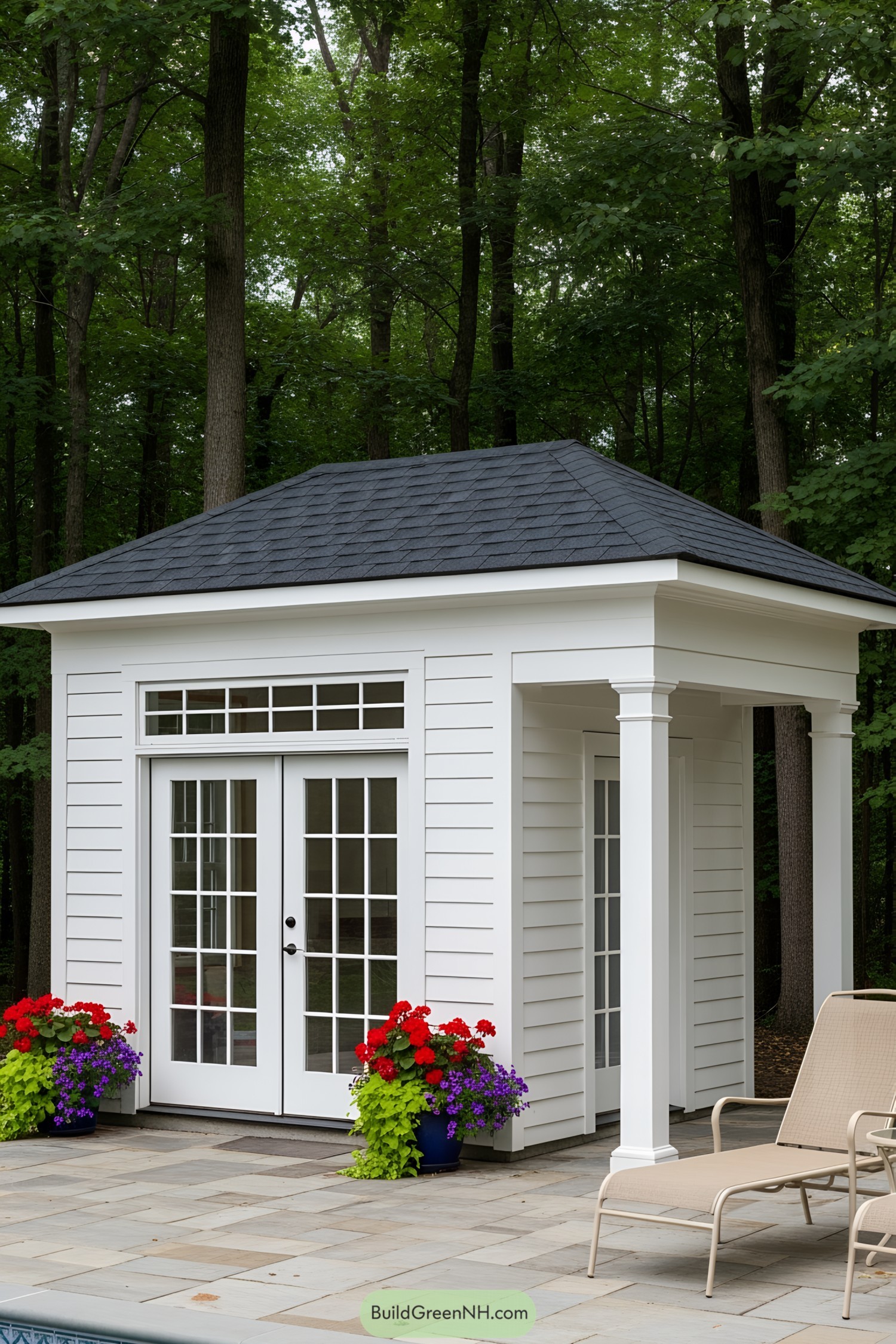 Small white pool house with double French doors