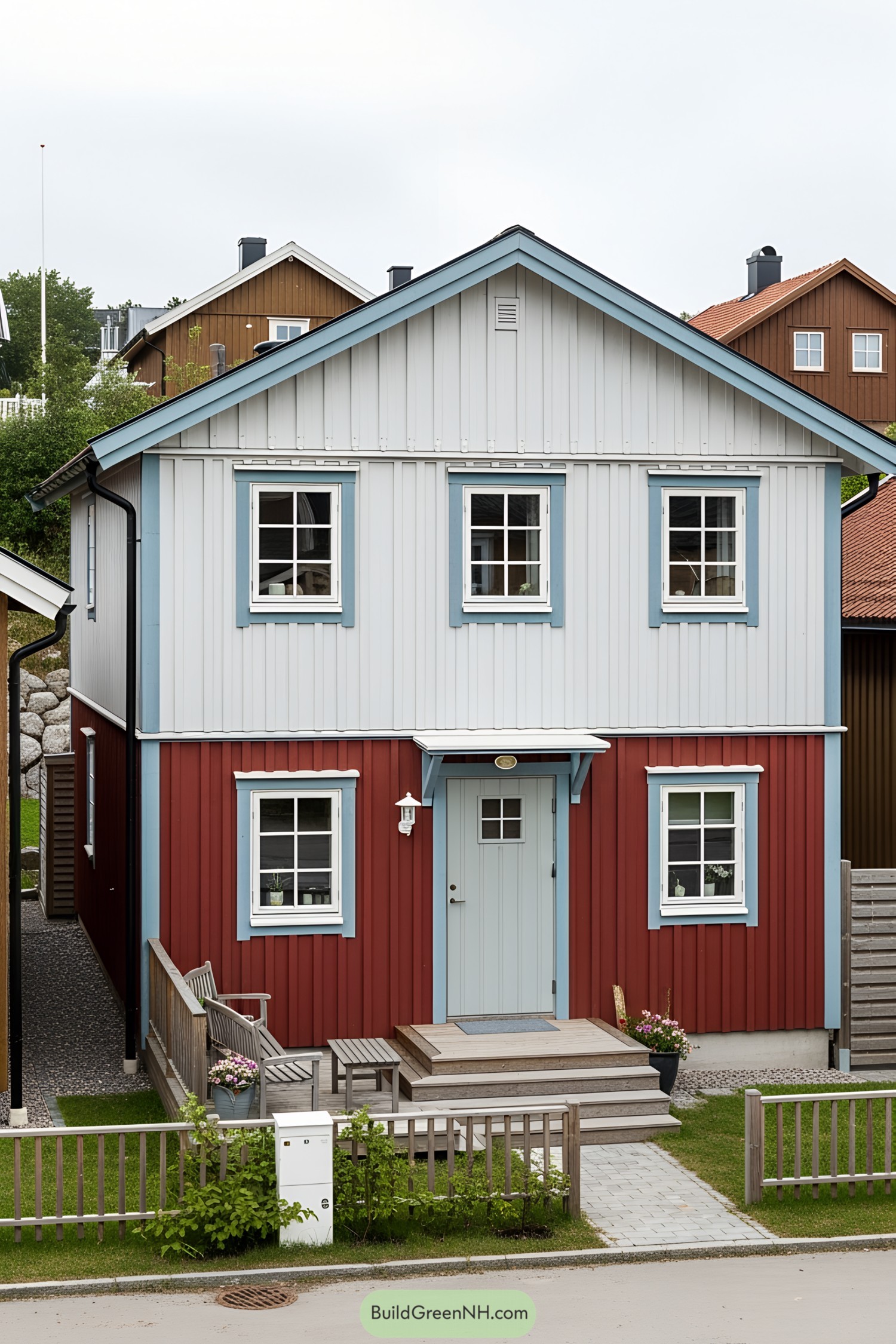 Charming small wooden house with pastel details and a welcoming front porch