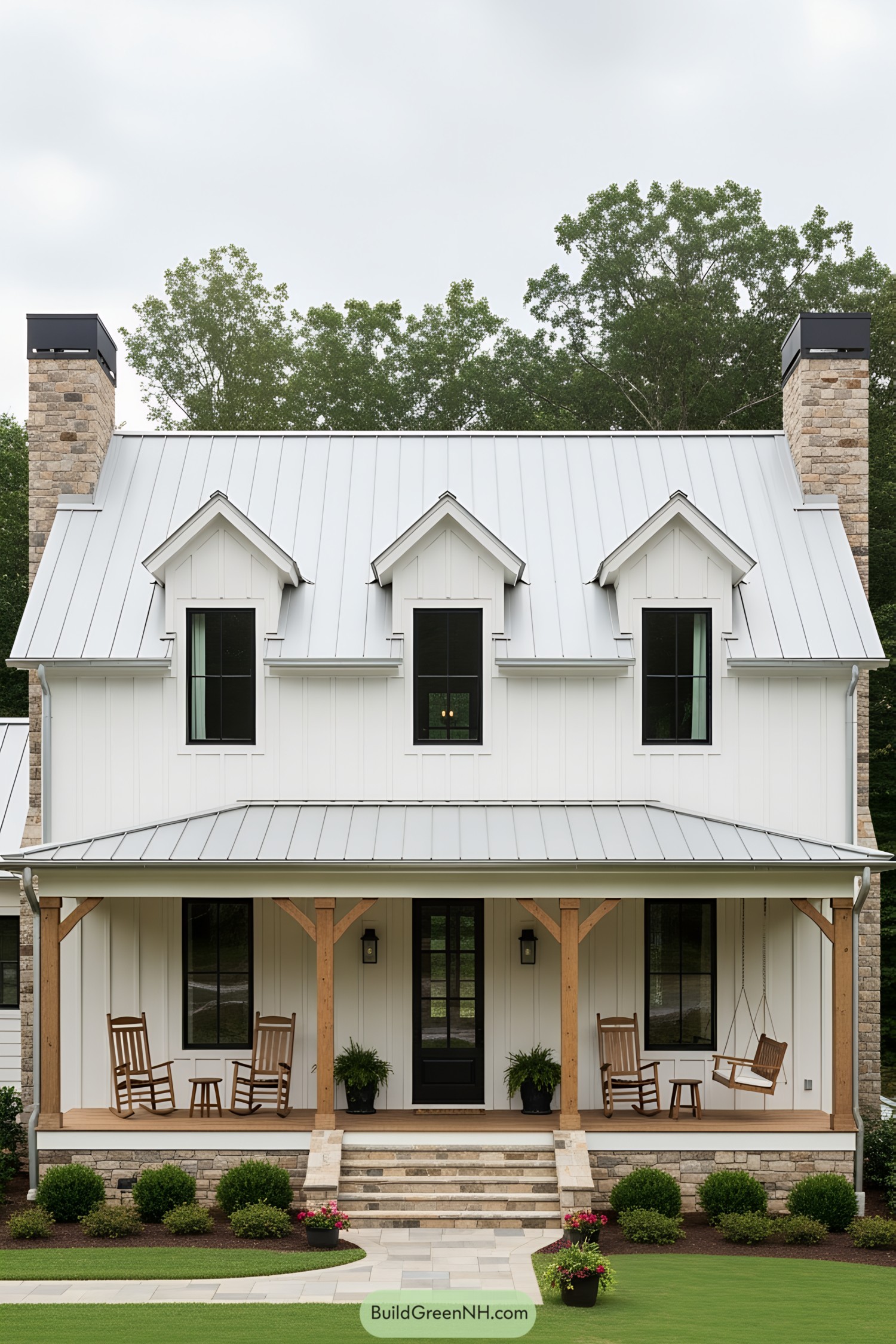 White farmhouse with a front porch and rocking chairs