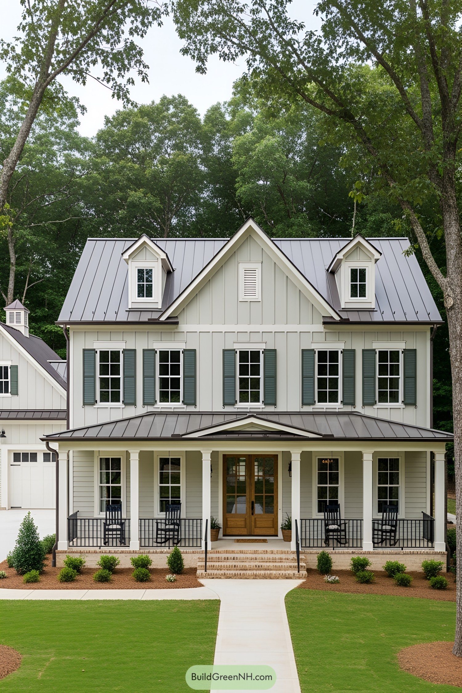 Southern farmhouse with greenery and a welcoming porch
