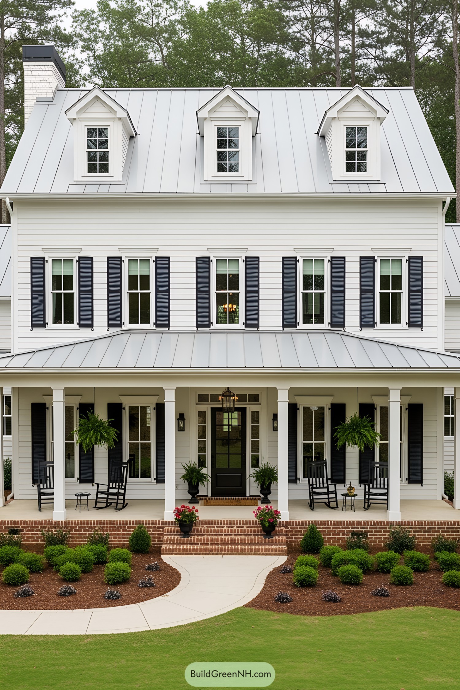 White Southern farmhouse with a large front porch and dormer windows
