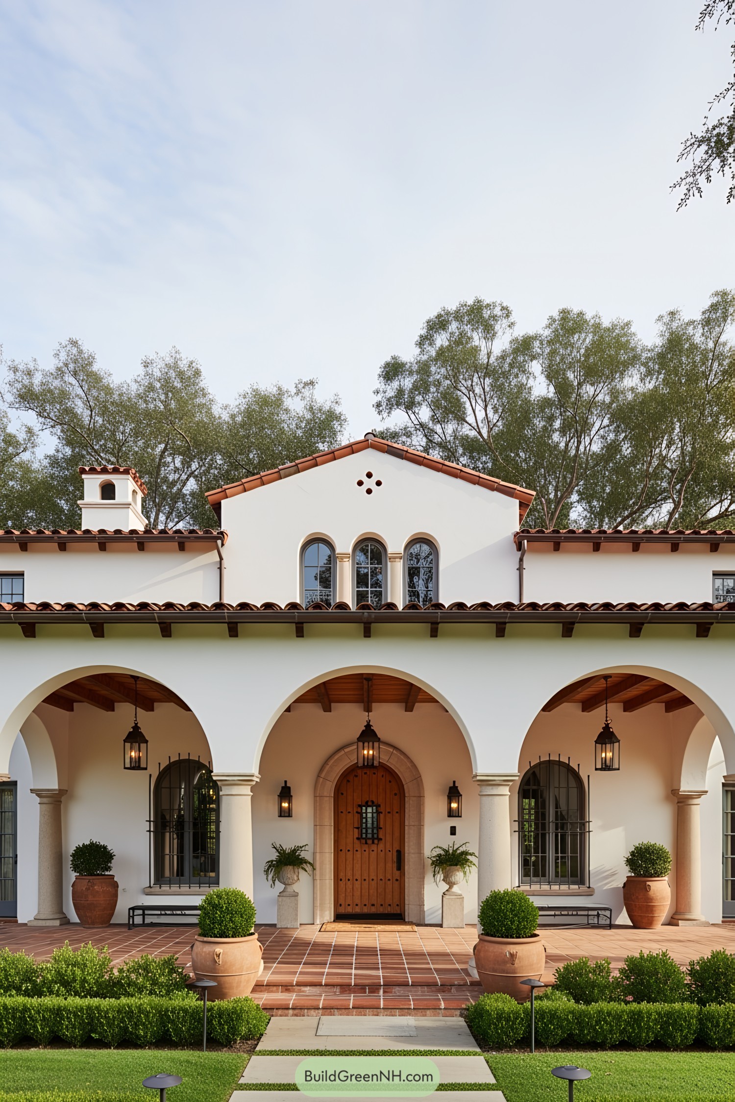 Elegant Spanish ranch house with arches and terracotta roofing