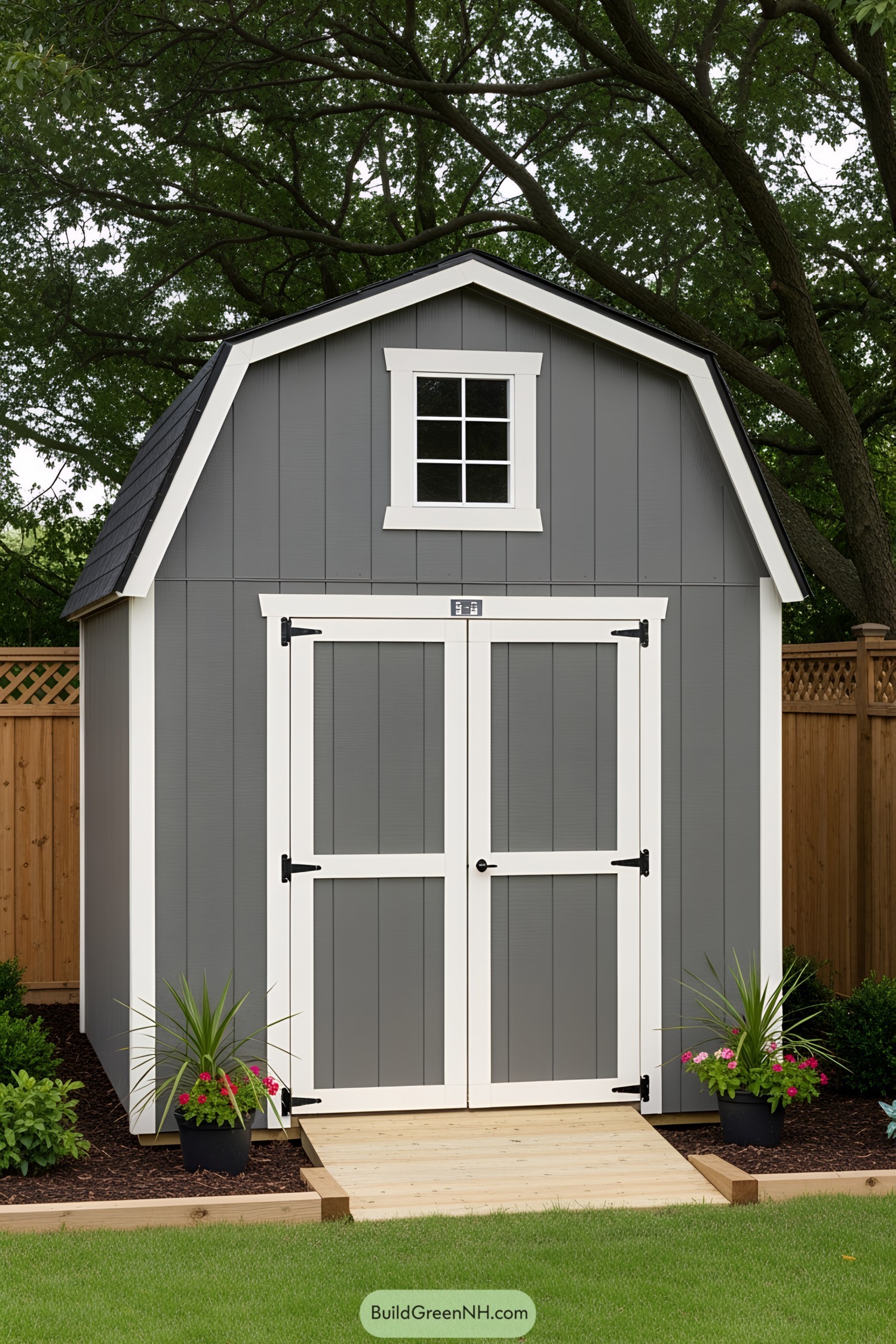 Gray storage shed with white trim and small window
