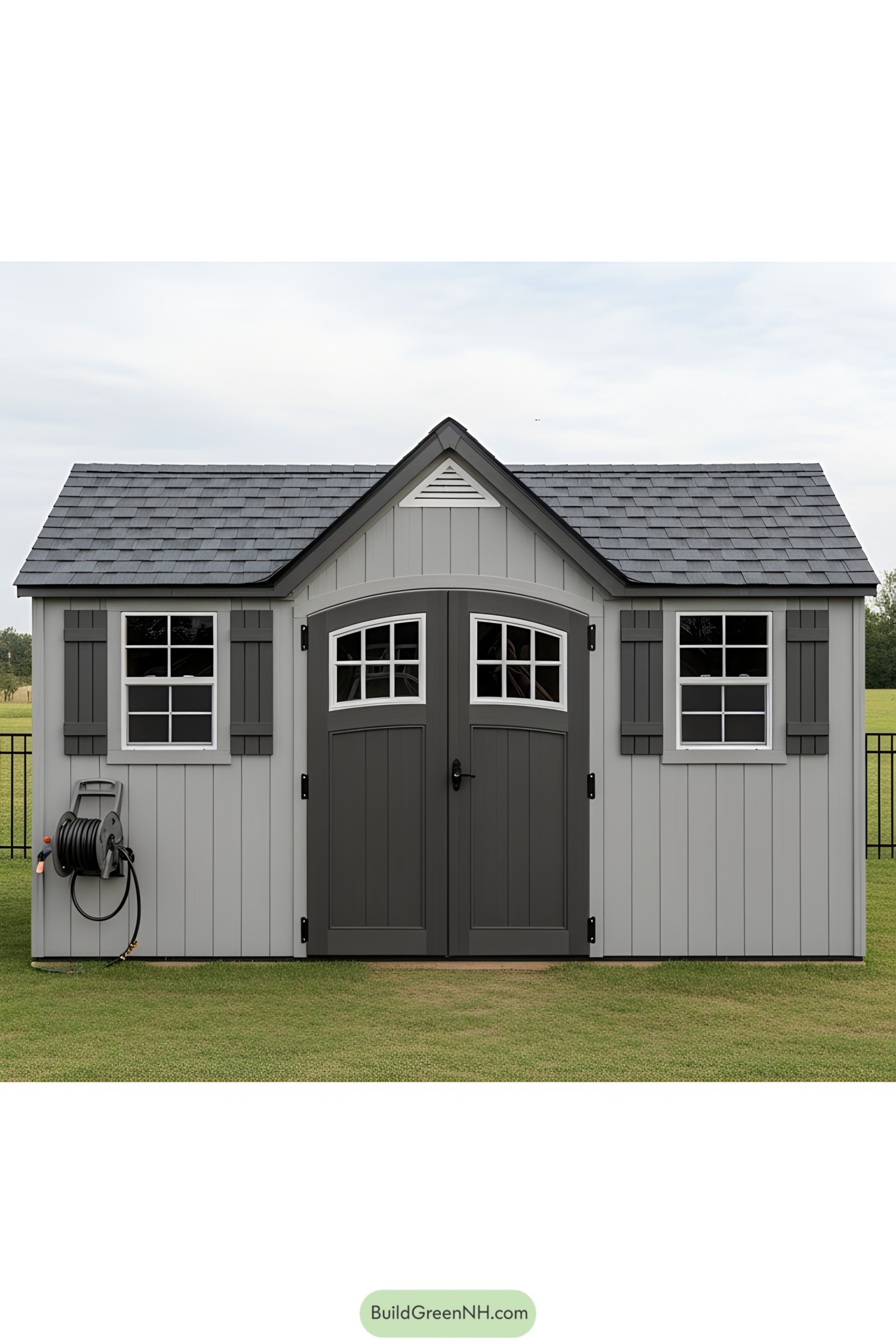 Gray storage shed with double doors and windows
