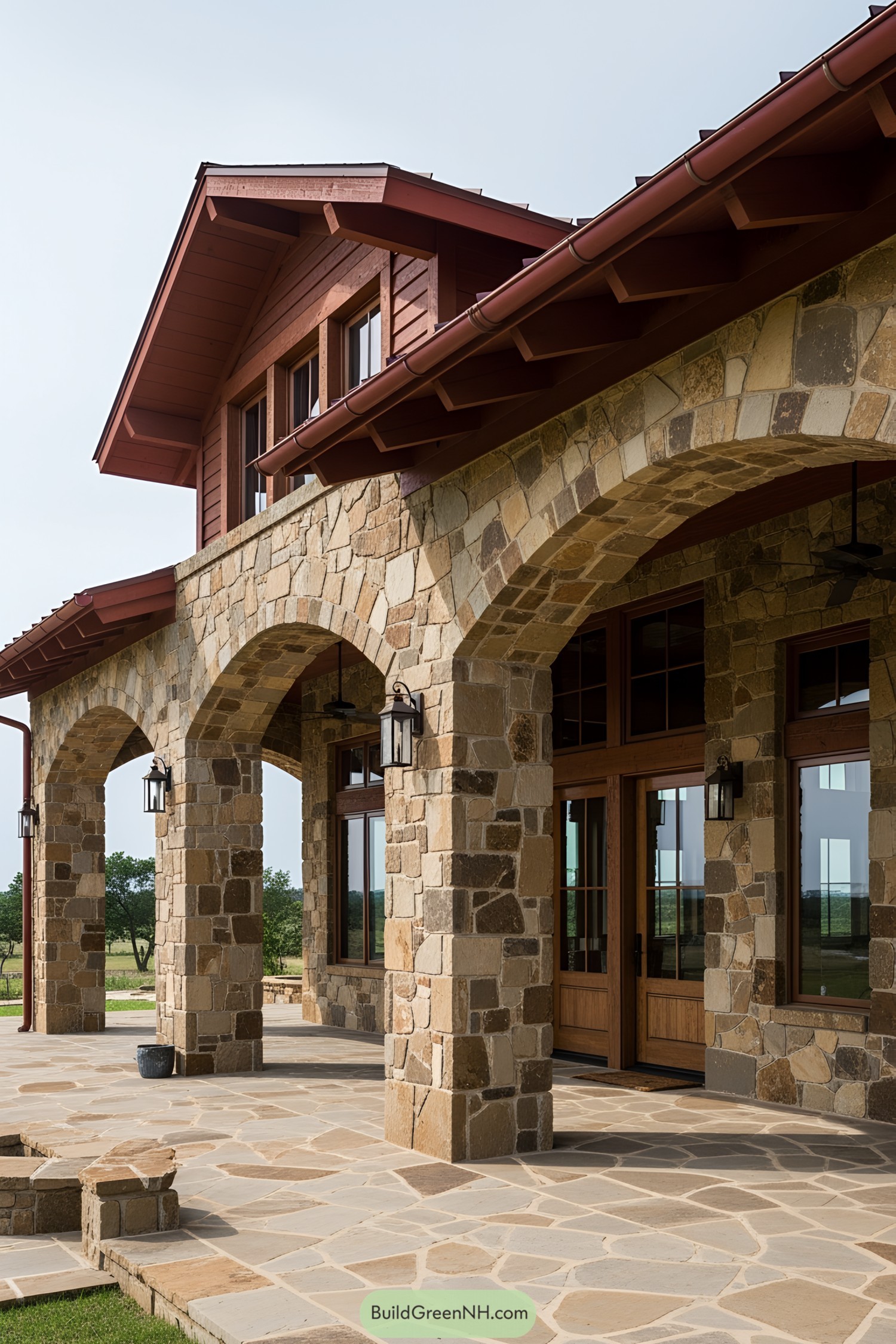 Stone ranch house with arched porch and wooden accents