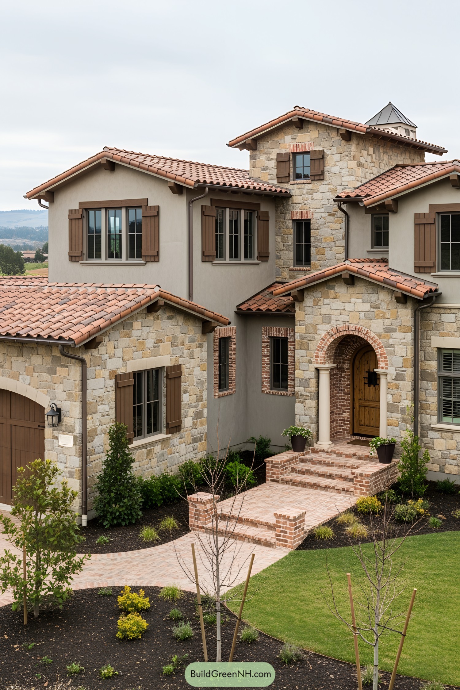 Tuscan-style house with stone walls and terracotta roof