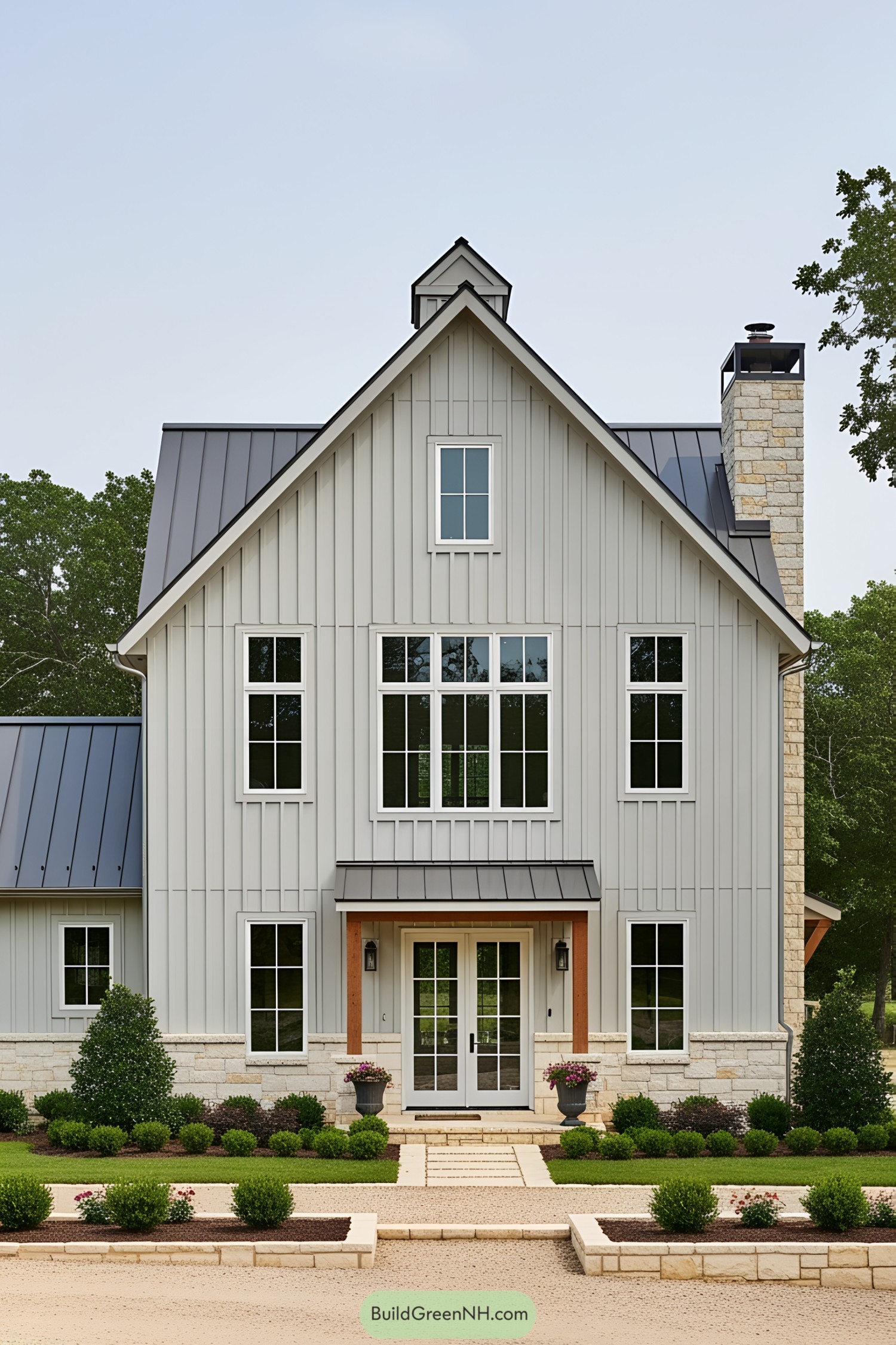 Chic barn-style house with stone accents and metal roof