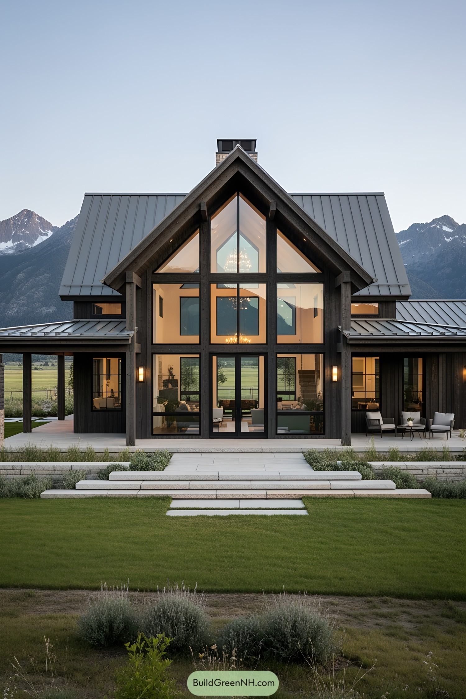 Contemporary ranch house with large glass windows and mountain view