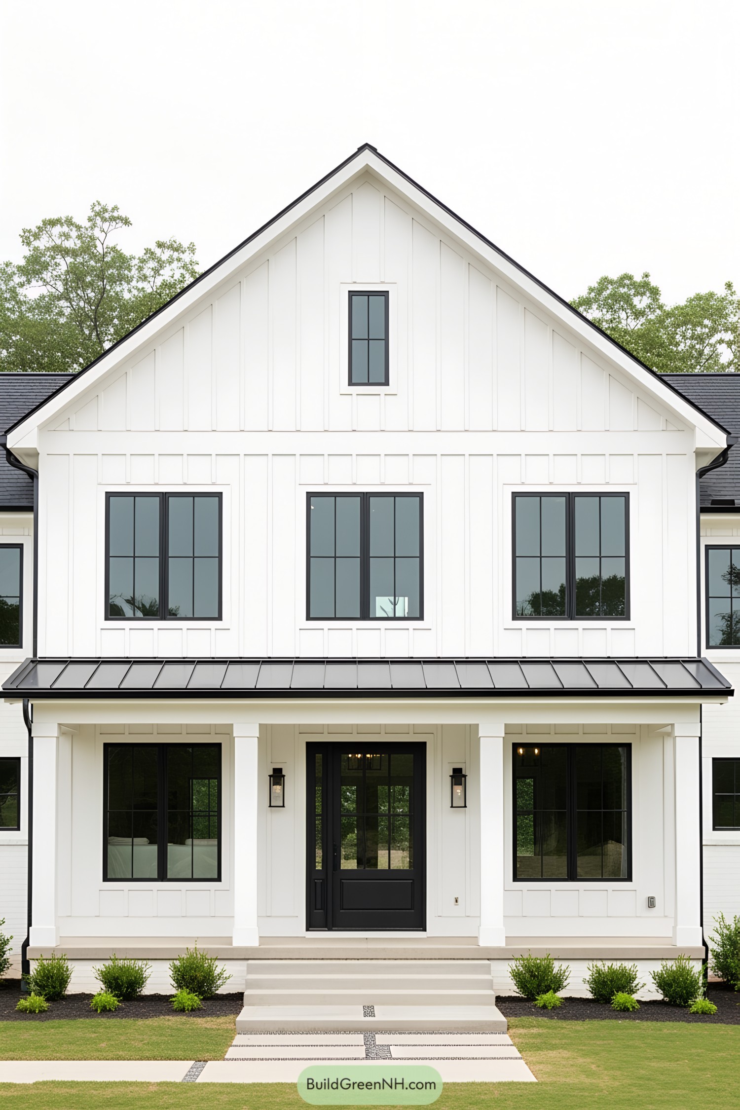 Sleek white farmhouse with black-trimmed windows