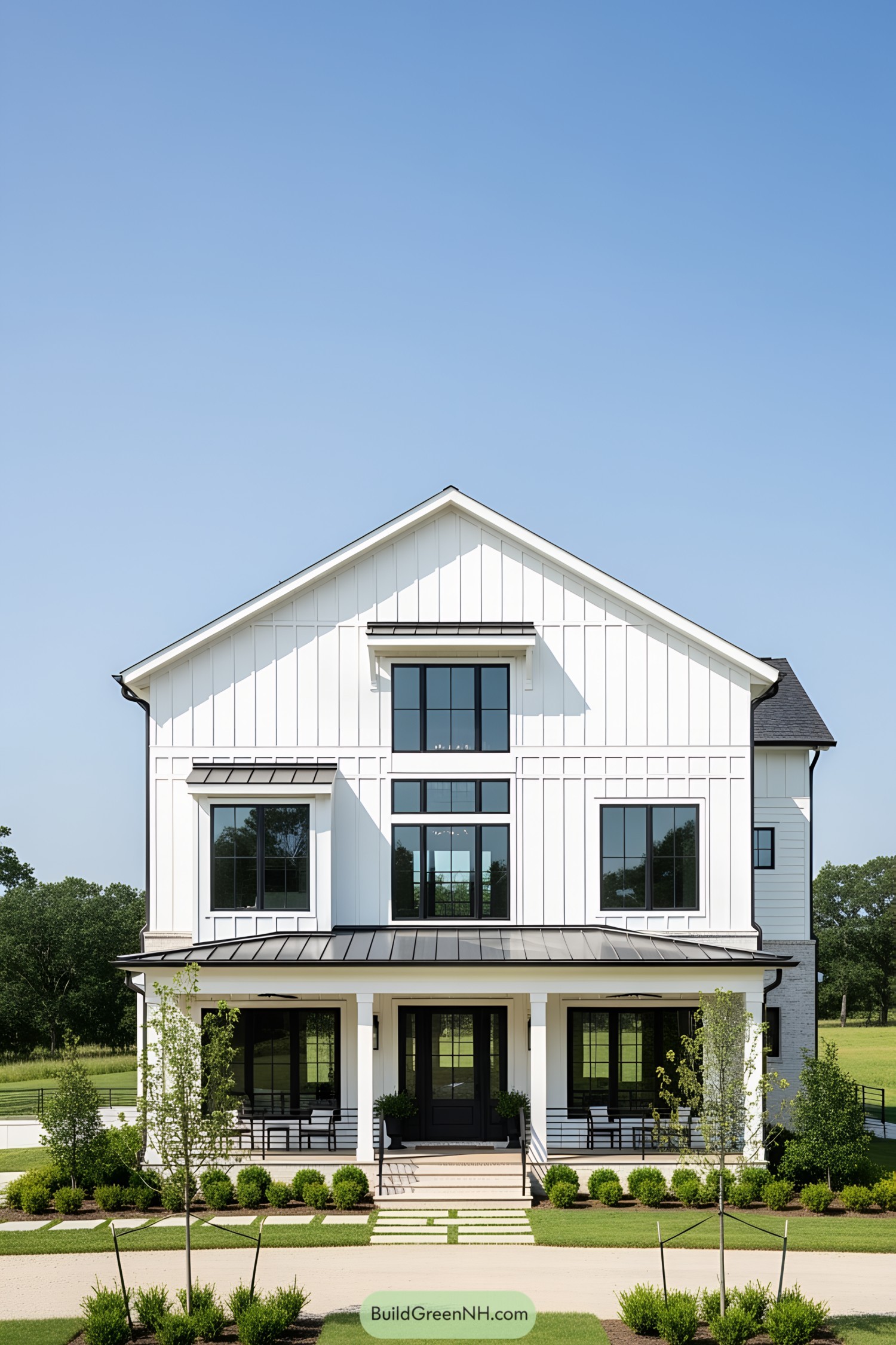Modern farmhouse with white exterior and large windows