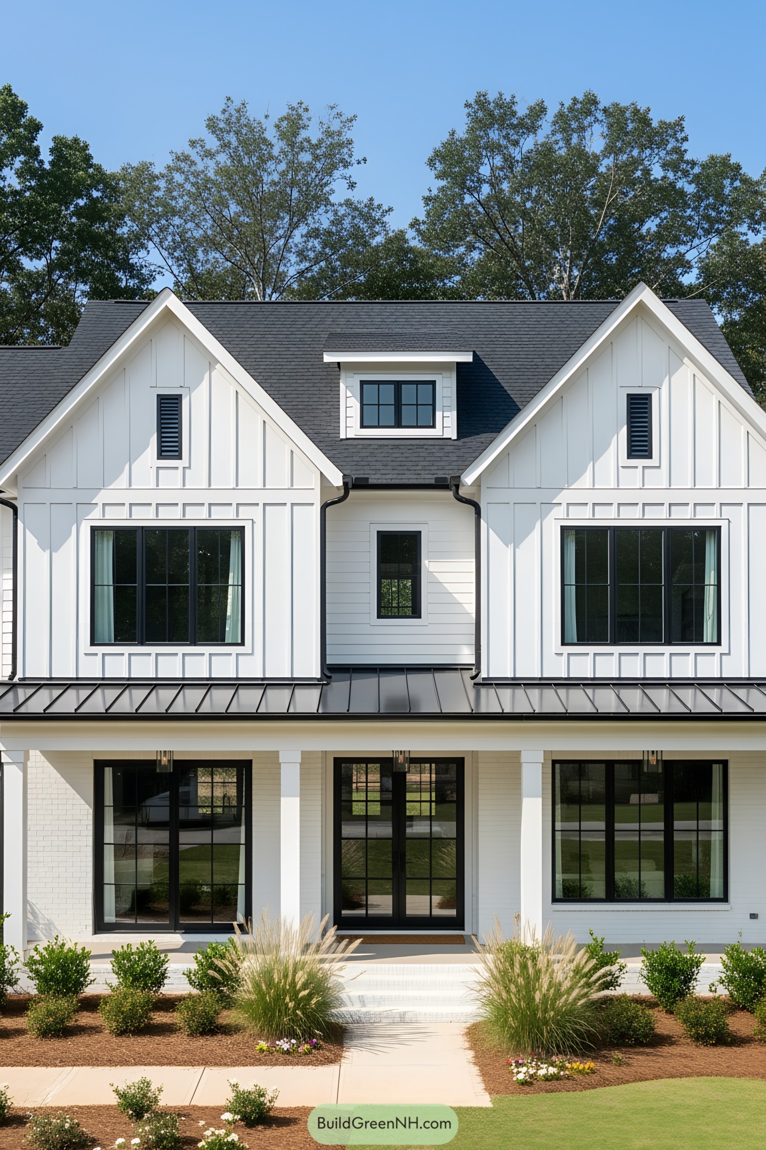 Stunning modern farmhouse with white exterior and black accents