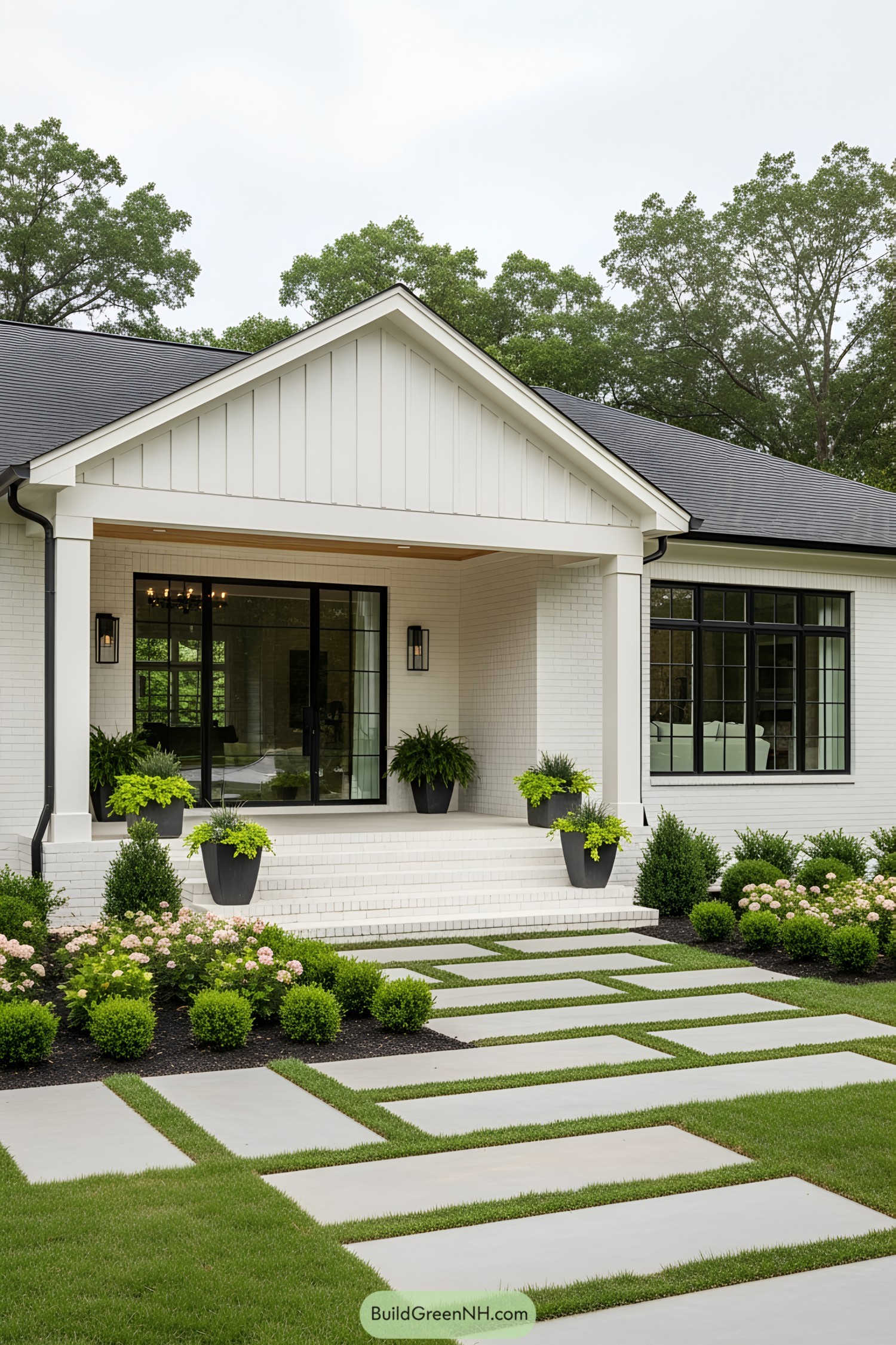 White ranch house with modern landscaping