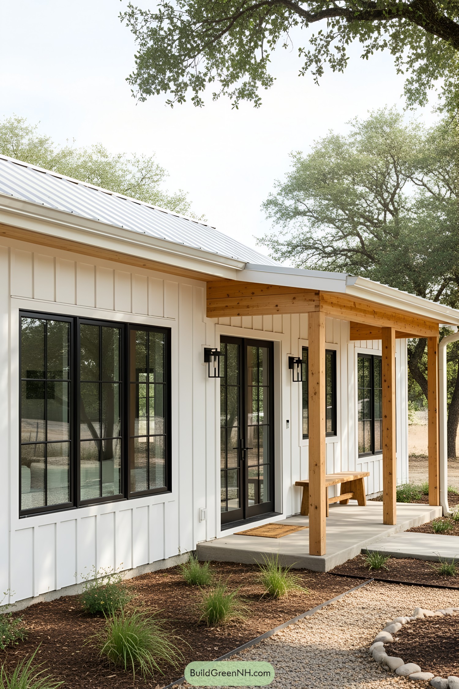 Charming white ranch house with wooden accents and large windows