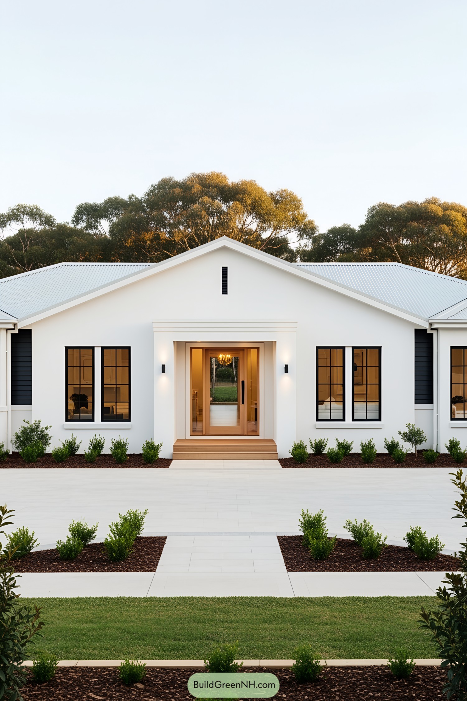 Elegant white ranch house with pristine landscaping